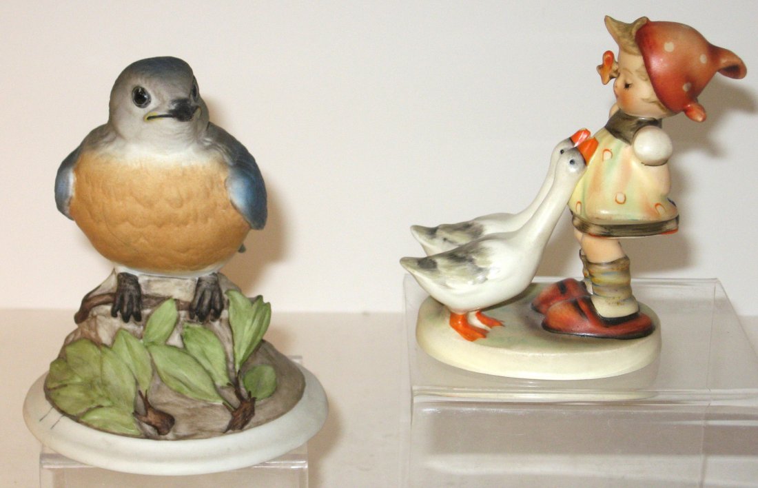 Boehm and Hummel figurine,: porcelain Hummel number 47 2/0 "Goose Girl" TOGETHER with a Boehm bird 442 "baby blue bird" both marked 4 3/4" ht.