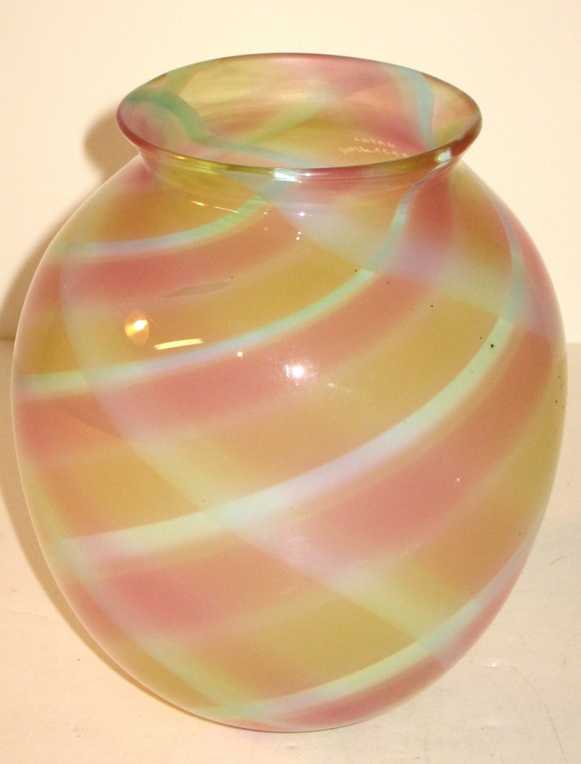 Stevens and Williams rainbow vase,: globular form in translucent glass decorated with a rainbow of rose, yellow, blue and white swirling bands, marked Patent Rd. no 46998, 6" ht.