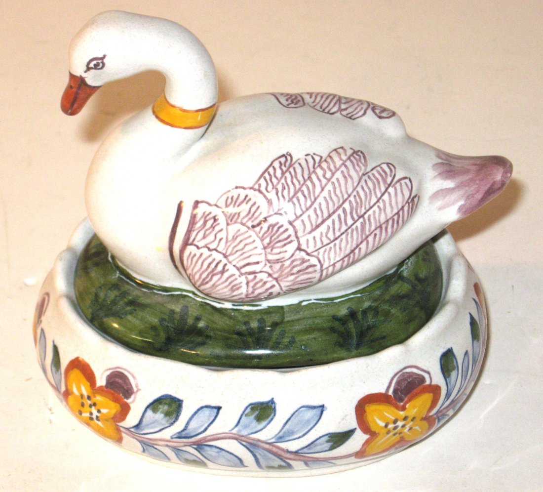 French faience figural swan dresser box: having swan figural on lid with base of box decorated with floral garland. Marked B. 9"L.