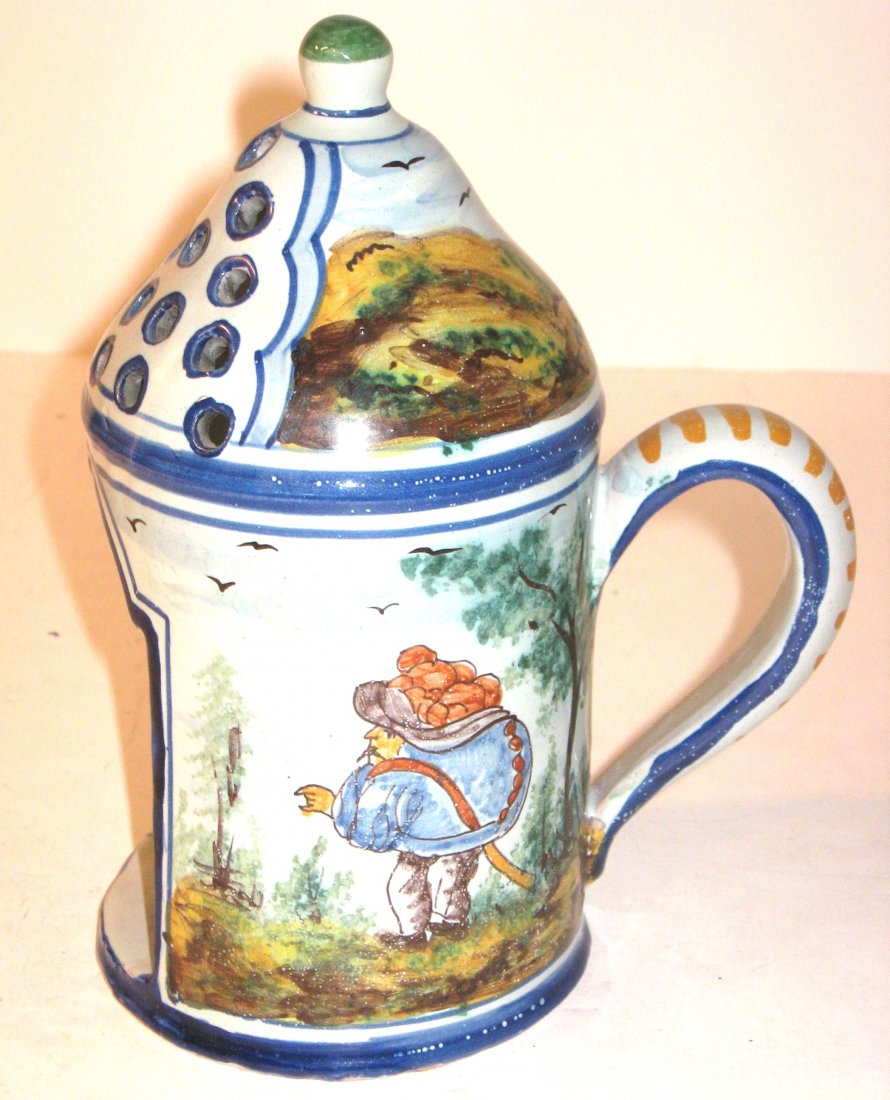 Nevers French faience Lantern: decorated with two men, scenic landscape and birds. Marked on base with a green bow and script letters. 7 1/4"H.