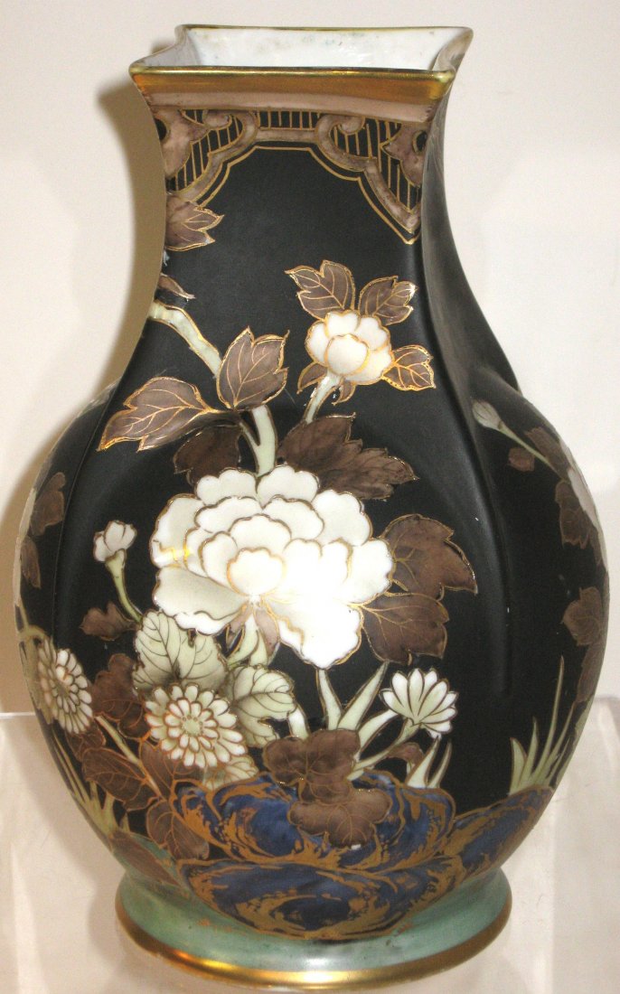 Nippon square mouth vase,: decorated with clusters of white and gold flowers set on a black background, marked, 9" ht.