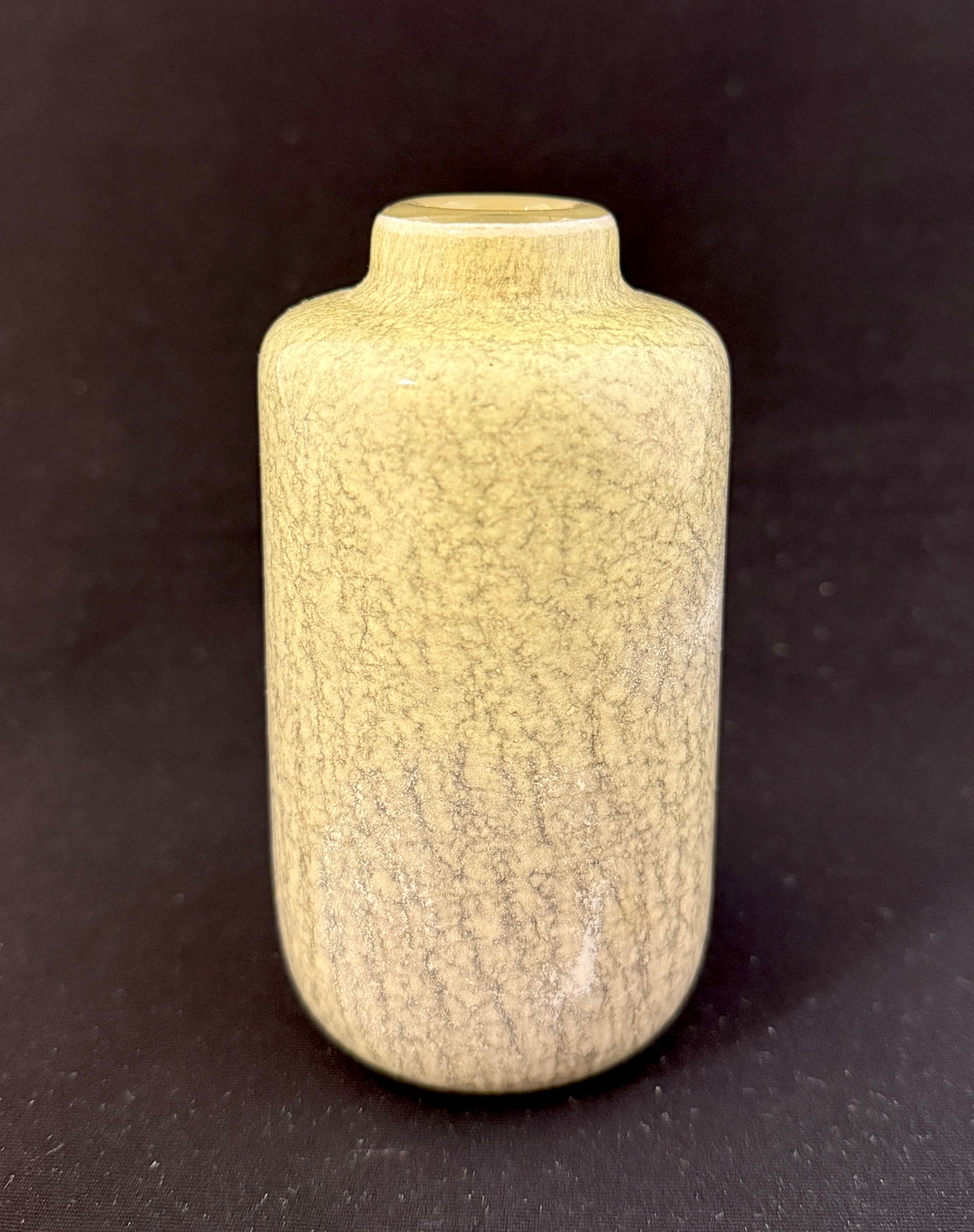 Richard Meitner Bottle Form Vase: Richard Meitner small bottle form vase in green with powder fusions, signed; 4 1/2" ht. CONDITION: no chips, cracks, repairs, or material defects found, Jaremos attempts to call any material flaw that