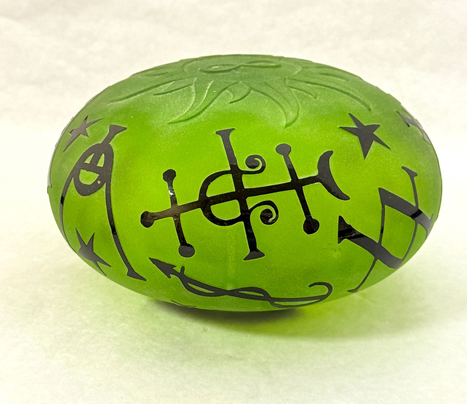 Duncan McClellan Sculpture: Duncan McClellan green frosted cameo glass sculpture with black geometric designs, signed Duncan McClellan #8; 6 5/8" diameter. CONDITION: no chips, cracks, repairs, or material defects found, Jaremos