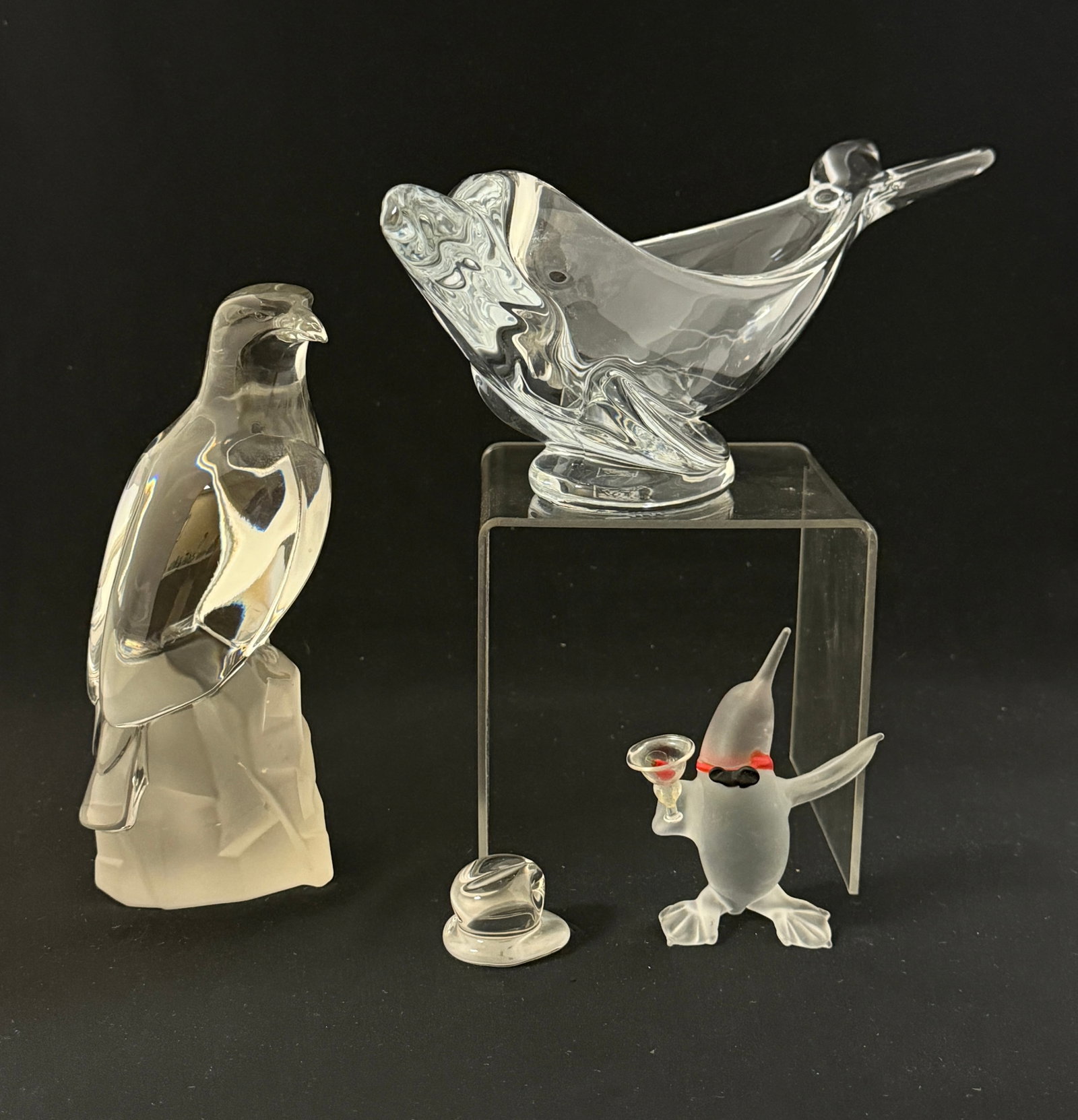4 Animal Sculptures: 4 clear glass animal sculptures including a dolphin dish with etched Art Vanity France signature, a penguin, a small frog, and an eagle; CONDITION: no chips, cracks, repairs, or material defects found
