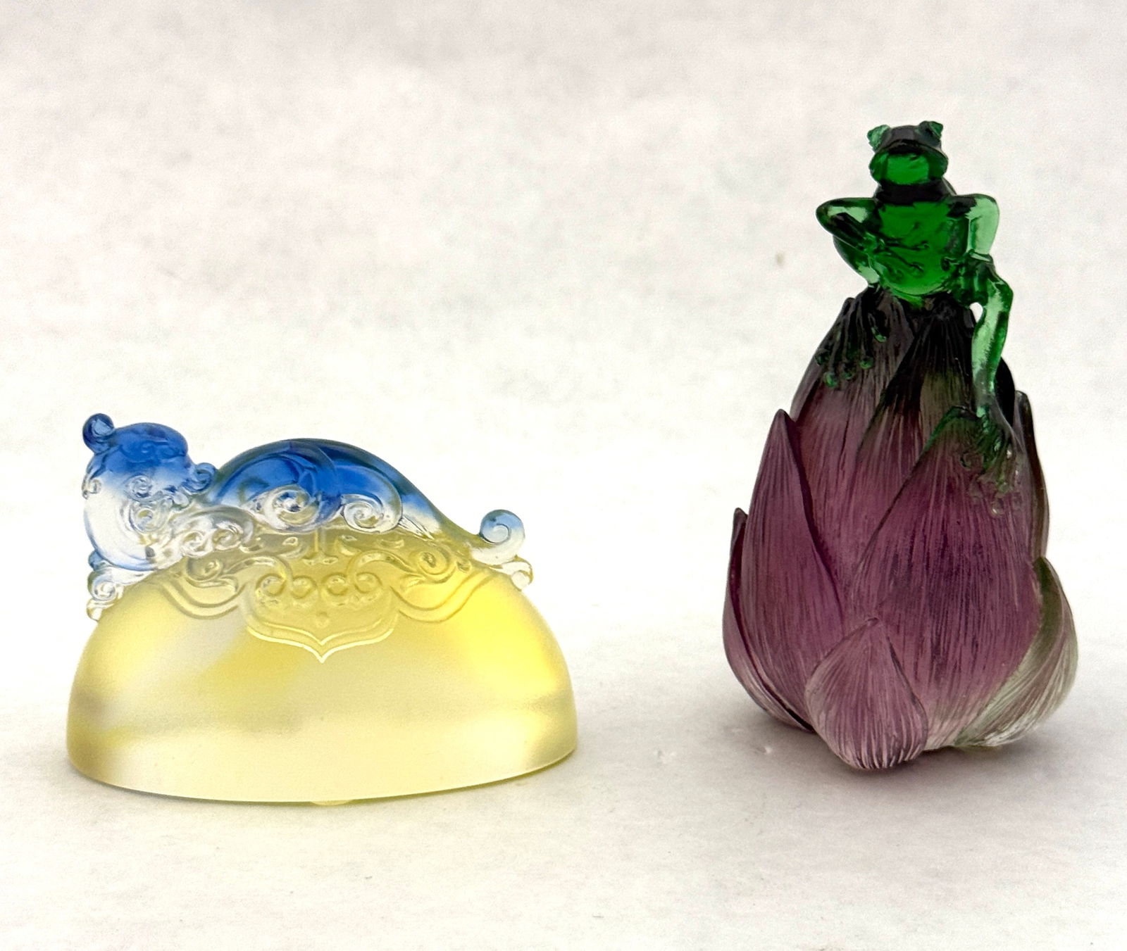 2 Tittot paperweight sculptures: 2 Tittot paperweight sculptures titled "As the Satisfied Dragon Lofty Aspirations' and "Straight Forward Manner" tallest 3 1/2" ht. CONDITION: new in box