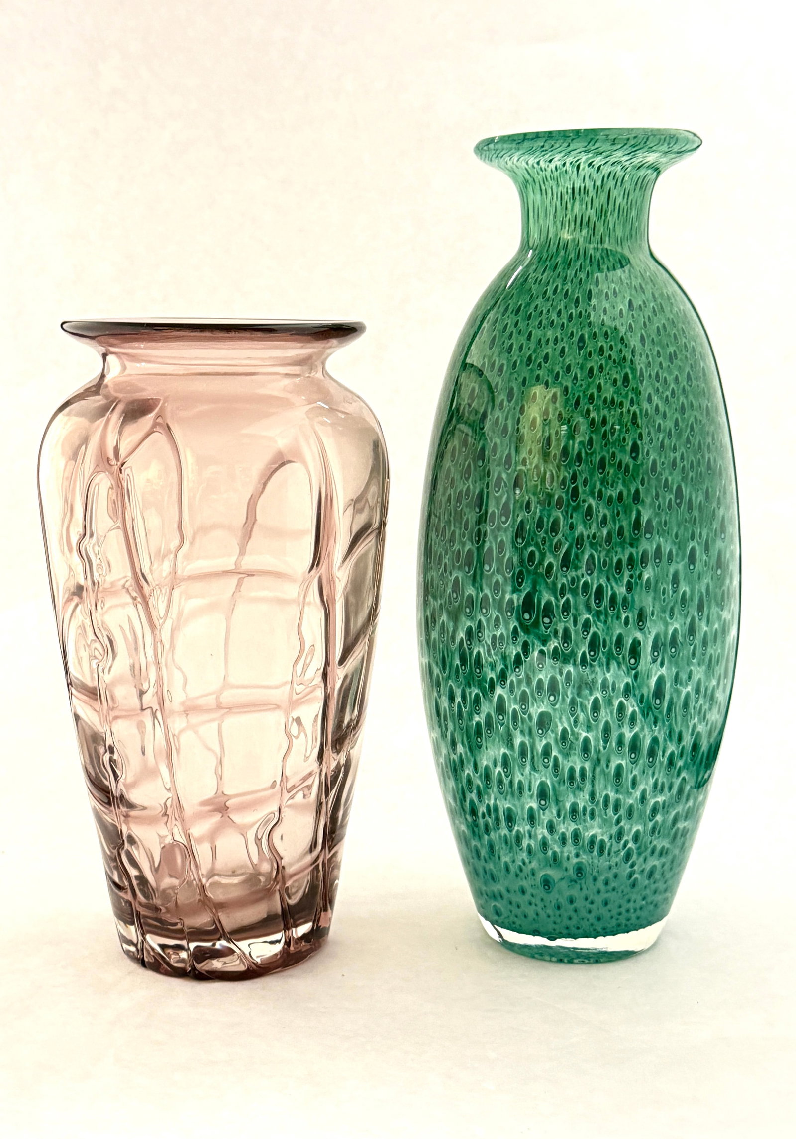 2 Contemporary Art Glass Vases: 2 Contemporary art glass vases, 1 green cluthra together with a purple threaded vase in style of Pallme-Konig; tallest; 12 1/4". CONDITION: no chips, cracks, repairs or material defects found, Jaremos