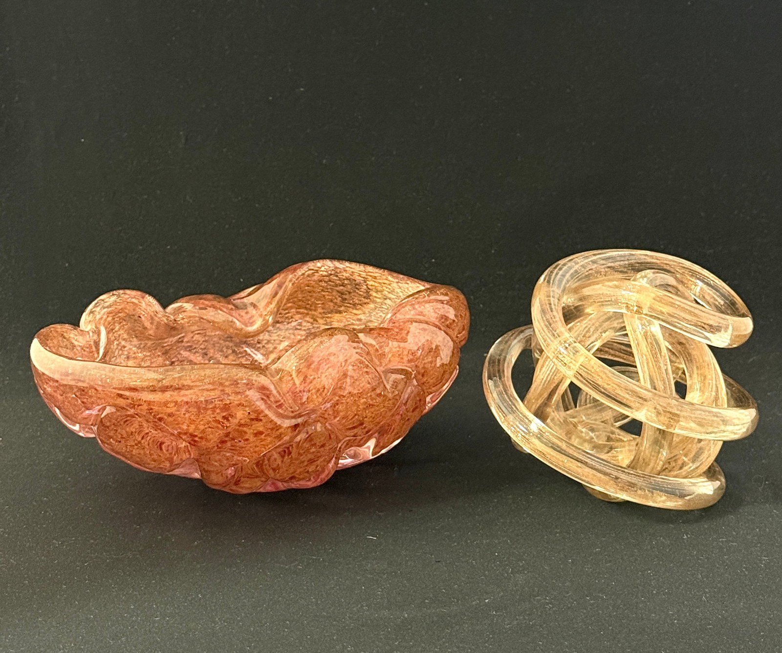 2 Murano Art Glass Items: 2 Murano Aventurine items including a shell bowl and a Zanetti style twisted rope; diameter of dish 8 1/2". CONDITION: no chips, cracks, repairs, or material defects found, Jaremos attempts to call an