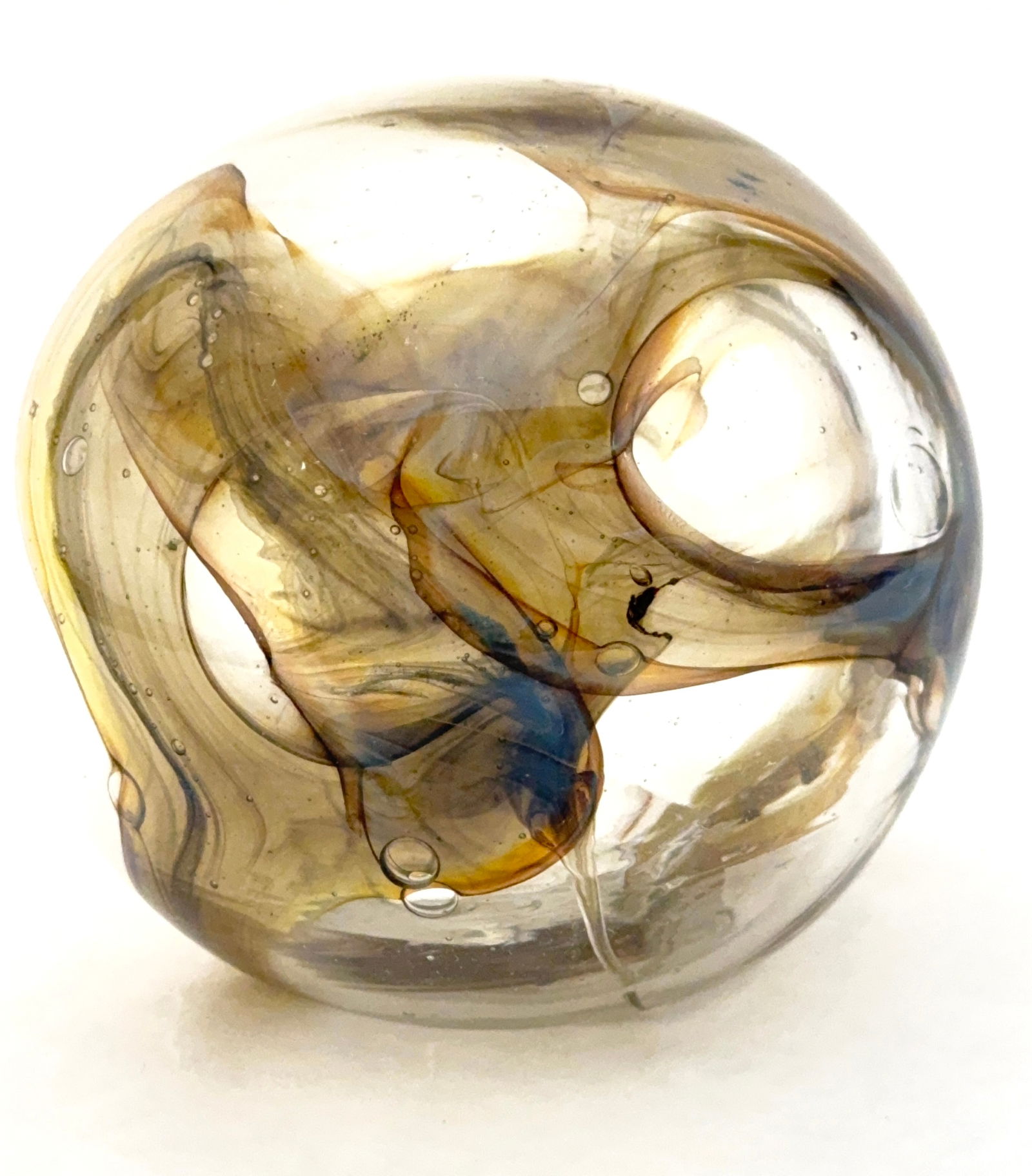 R. Fein Art Glass Paperweight: R. Fein clear paperweight with swirling smokey amber and blue, signed R. Fein '69; 3 1/2" diameter. CONDITION: no chips, cracks, repairs, or material defects found, Jaremos attempts to call any materi