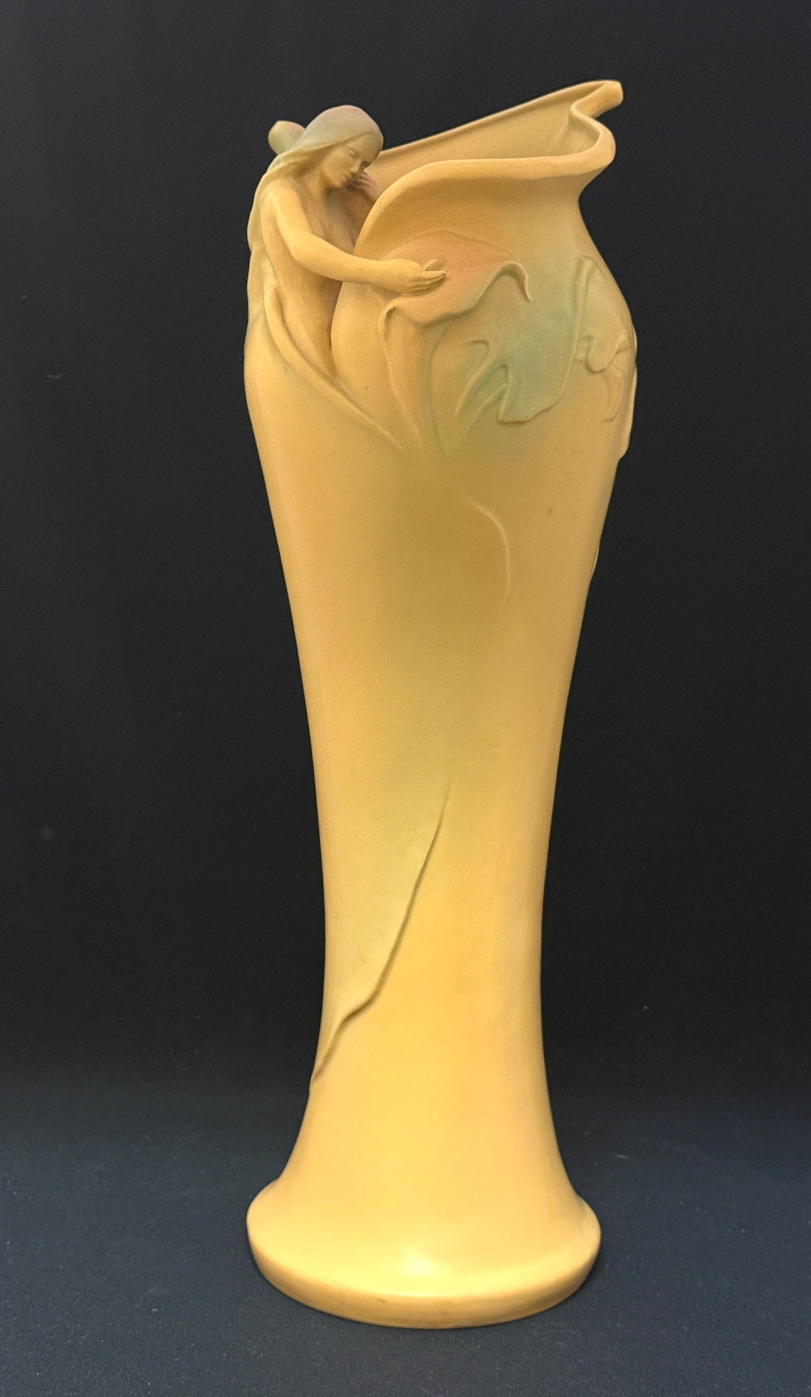 Tall Van Briggle Vase: Tall Van Briggle vase with nude, signed G. Stevenson; ht 18 1/8". CONDITION: no chips, cracks, repairs or material defects found. Jaremos attempts to call any material flaw that affects the price, but