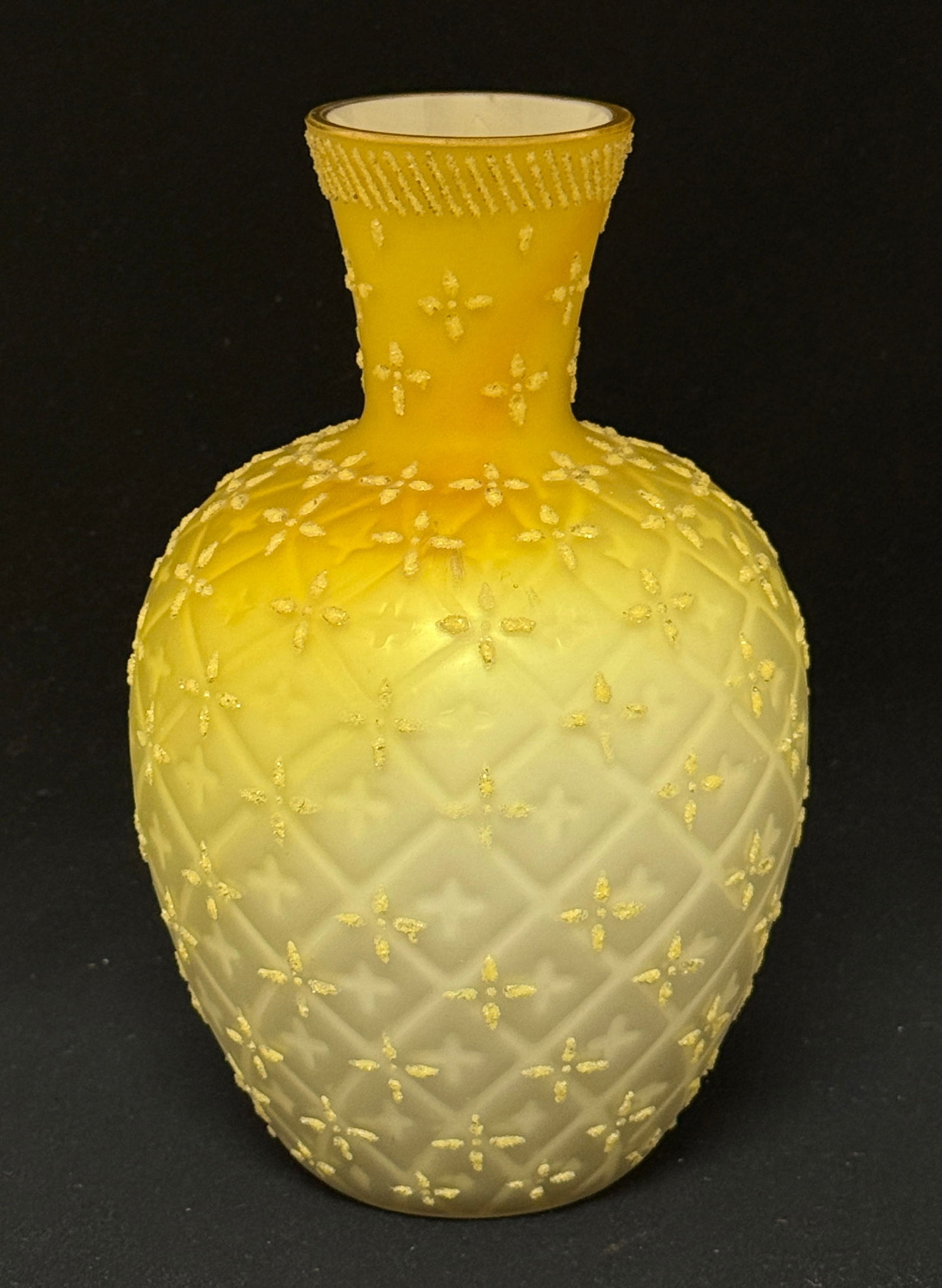 MOP Coralene Glass Vase: Mother of Pearl yellow glass vase decorated with yellow Coralene flowers, 7 3/4" ht. CONDITION: no chips, cracks, repairs or material defects found, Jaremos attempts to call any material flaw that aff