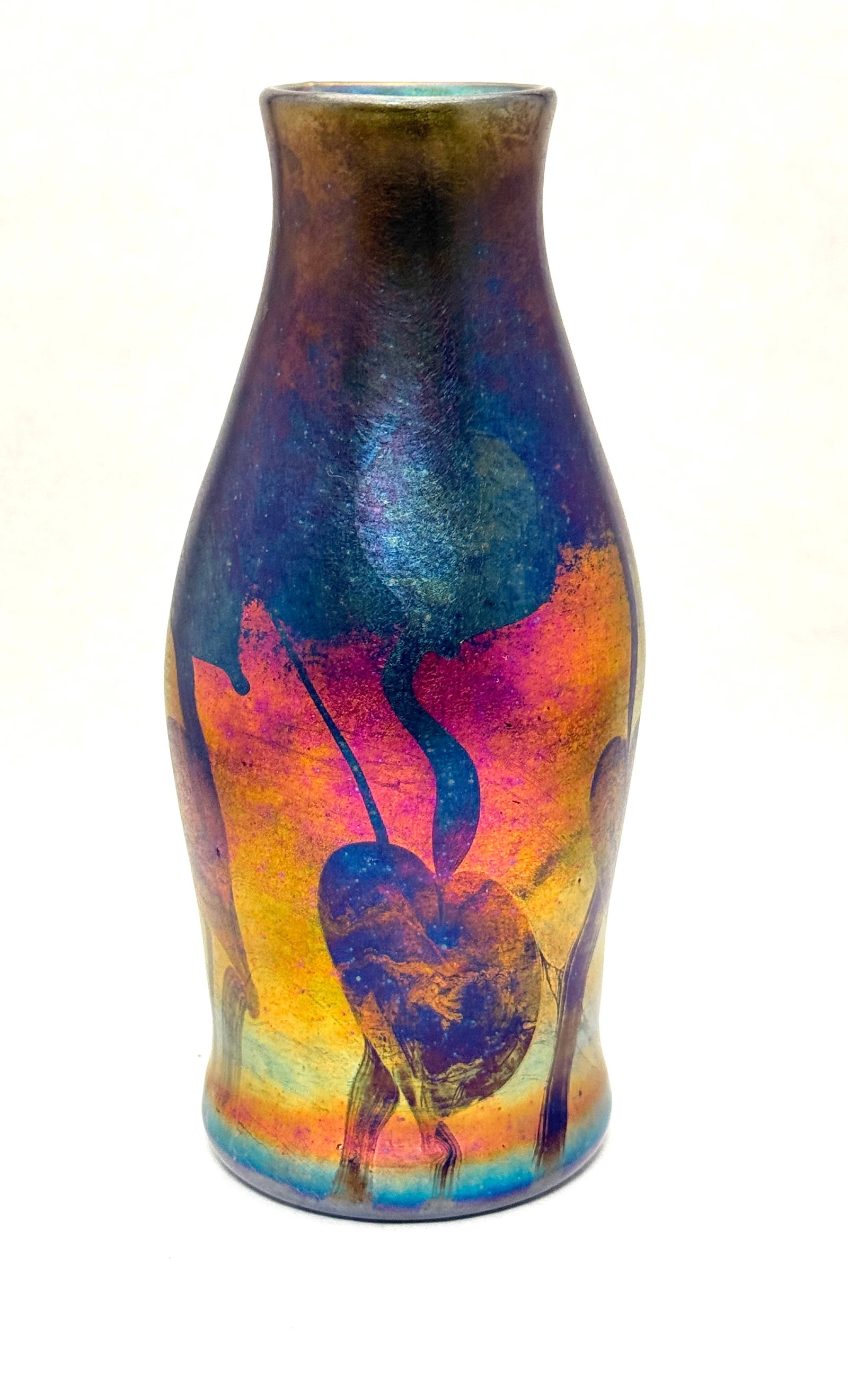 Attributed to Travaise Vase: Attributed to Trevaise vase, dark green with iridescent pink hearts; ht 9 1/4". CONDITION: no chips, cracks, repairs or material defects found, Jaremos attempts to call any material flaw that affects 