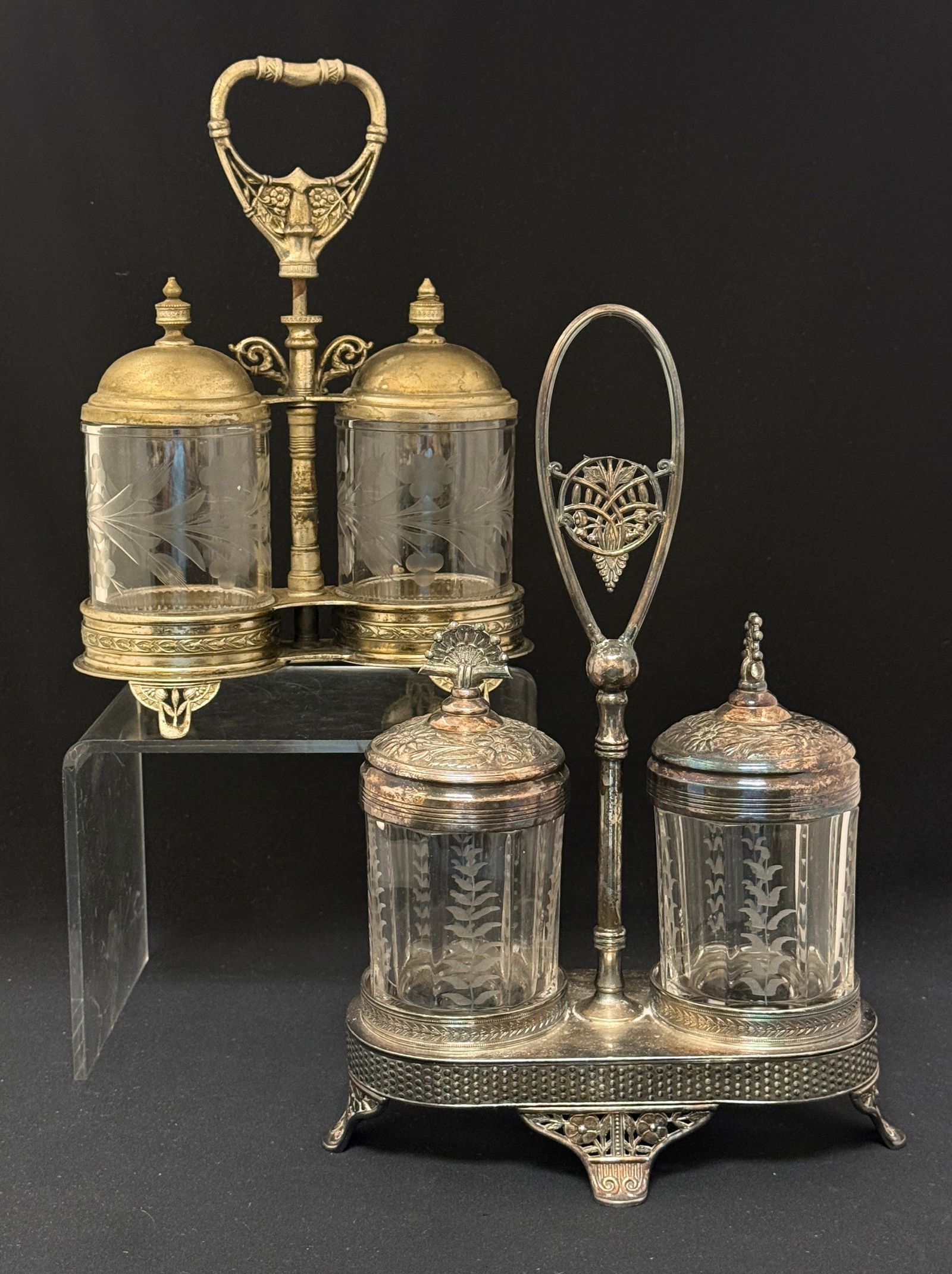 2 Pairpoint Double Pickle Castors: 2 Pairpoint double crystal pickle castors with etched floral design, both marked Pairpoint; tallest ht 13 1/4". CONDITION: no chips, cracks, repairs or material defects found, Jaremos attempts to call