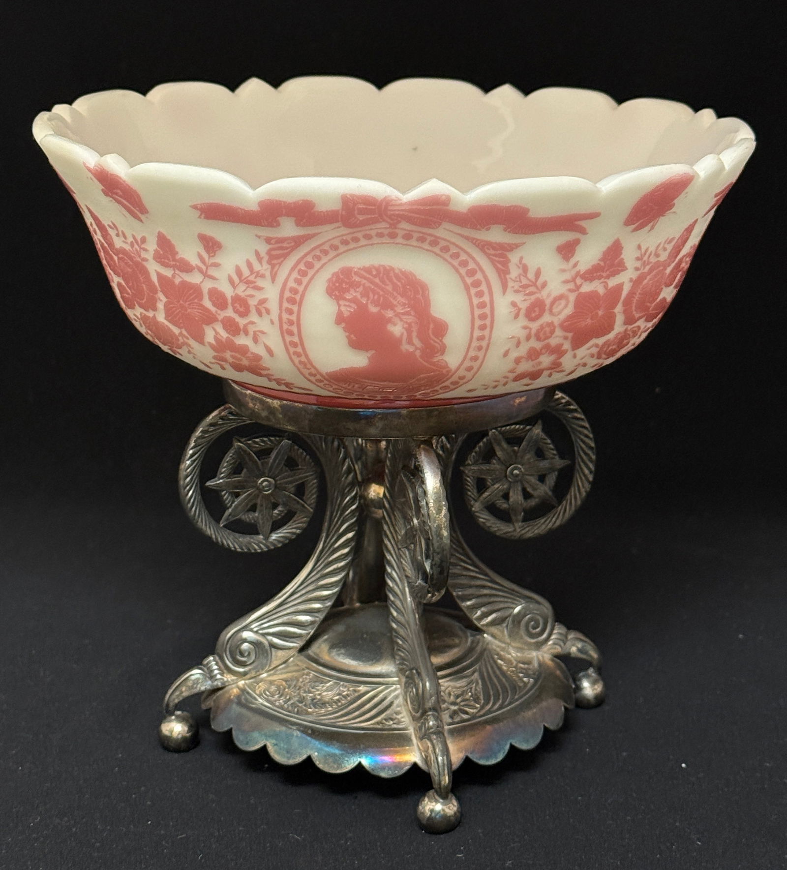 Mt. Washington Bride's Basket: Elegant Mt. Washington pink cameo bride's basket with female silhouettes set on a marked Pairpoint stand; ht 7 3/4". CONDITION: no chips, cracks, repairs or material defects found, Jaremos attempts to