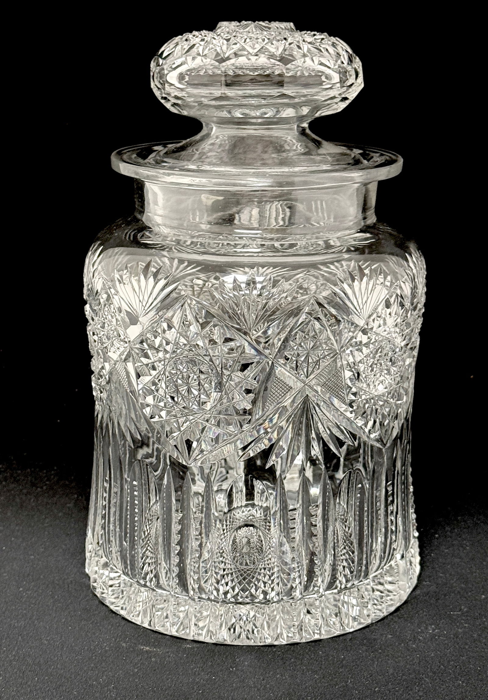 American Brilliant Cut Humidor: American Brilliant Cut Glass Humidor with fan, hob star and ray cuts, hob star cut lid, 10" ht. CONDITION: no chips, cracks, repairs or material defects found. Jaremos attempts to call any material fl