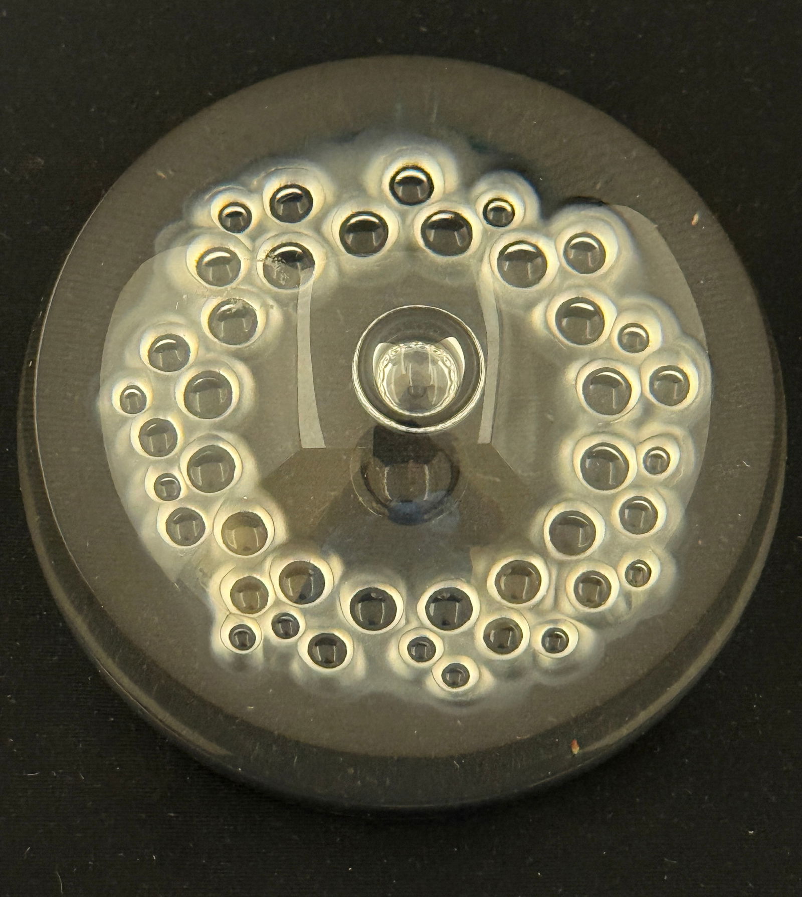 Steuben Clear Paperweight: Steuben clear paperweight with interior bubbles, signed Steuben EGH 71/500; diameter 4 1/4" ht 2 5/8". PROVENANCE: from the collection of Mark Chamovitz. CONDITION: no chips, cracks, repairs or materi