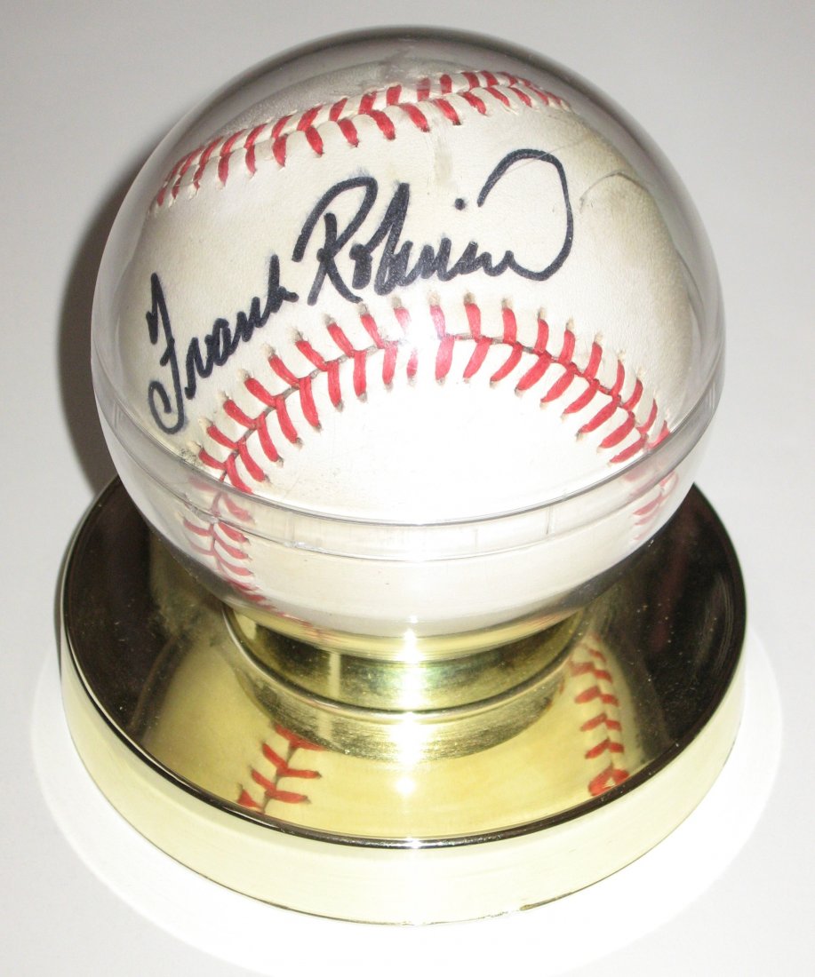 Frank Robinson signed baseball,: good signature on an official NL Charles Feeney baseball.