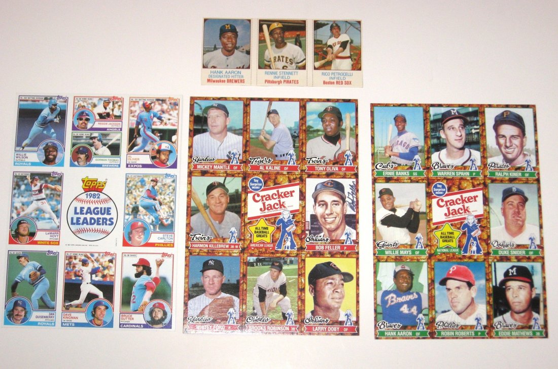 Three uncut sheets of baseball cards,: including a 1982 Topps League Leaders, two Cracker Jack 1982 sheet with Bob Feller autograph, and a 1975 Hostess panel #44 of Hank Aaron.