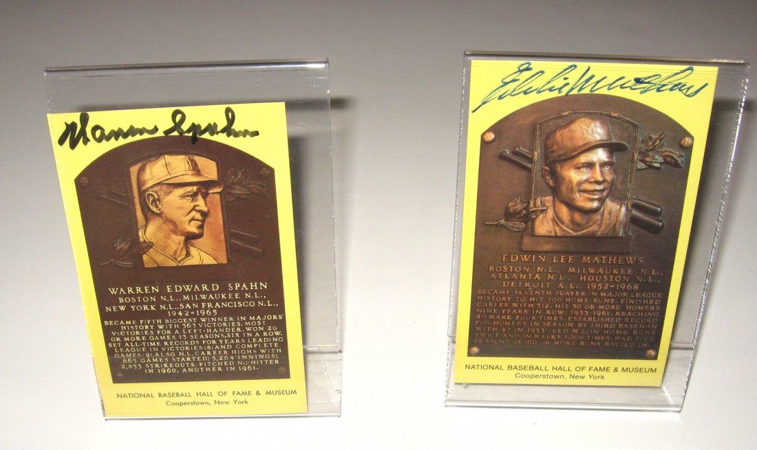 Spahn, Matthers hall of fame autographs,: Two yellow National Baseball Hall of Fame cards one of Warren Spahn and one of Edwin Matthews each signed and in plaster display frames.