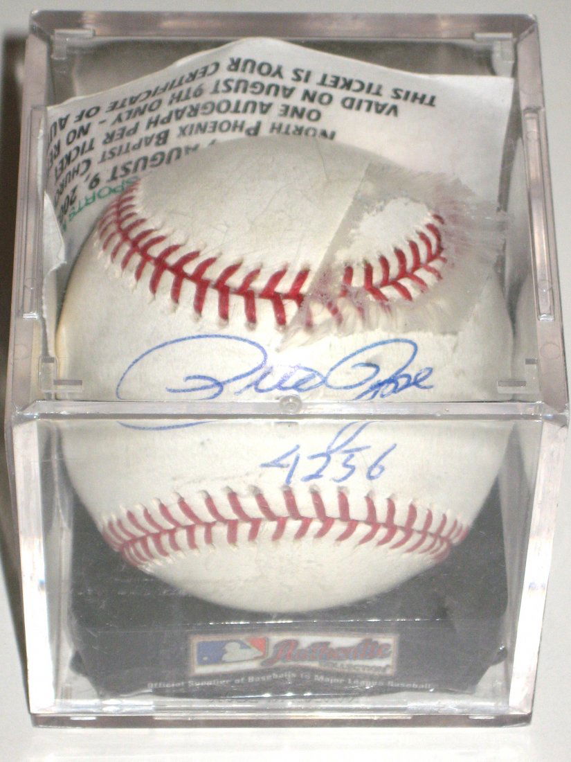 Pete Rose Autograph baseball,: signed by Pete Rose and inscribed 4256 representing the number of hits in his career, comes with case and ticket Certificate of authenticity. Personally acquired by Rev. Schulz.