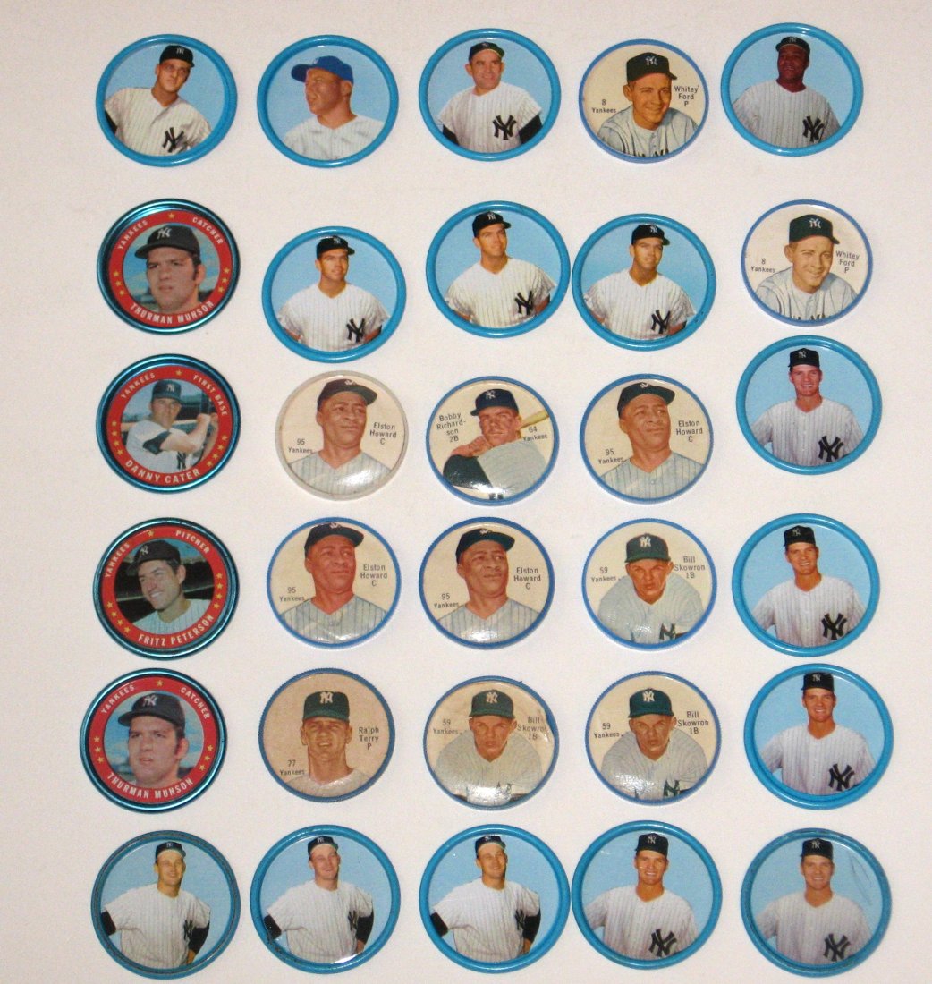 28 New York Yankee baseball coins,: including Salada 1962 Whitey Ford, Elston Howard, Ralph Terry, Bobby Richards. 1963 Salada Mickey Mantle, Roger Marris, and Yogi Berra. 1971 Topps Thurman Munson and more.