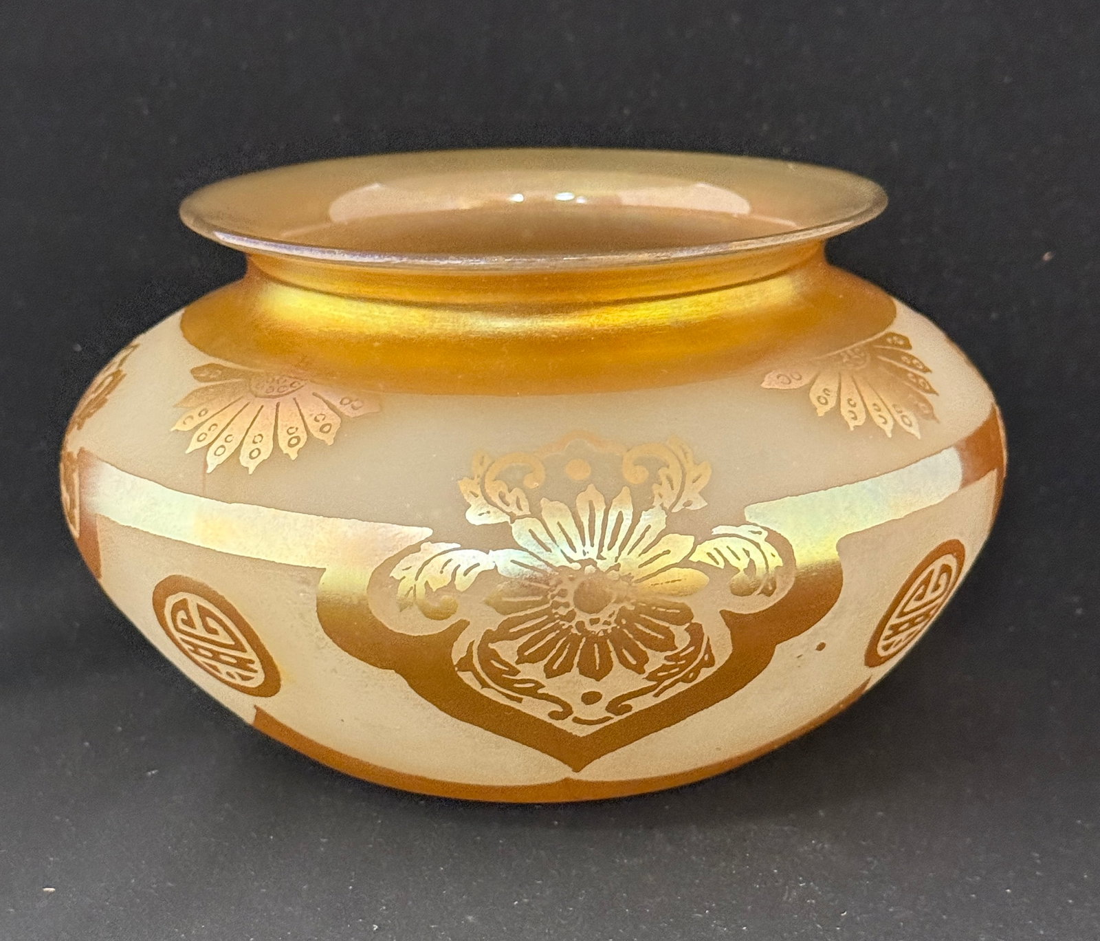 Steuben Acid Cutback bowl: Steuben acid cutback bowl, gold aurene on opal in a Chinese design; ht. 4 1/2". CONDITION: no chips, cracks, repairs, or material defects found, Jaremos attempts to call any material flaw that