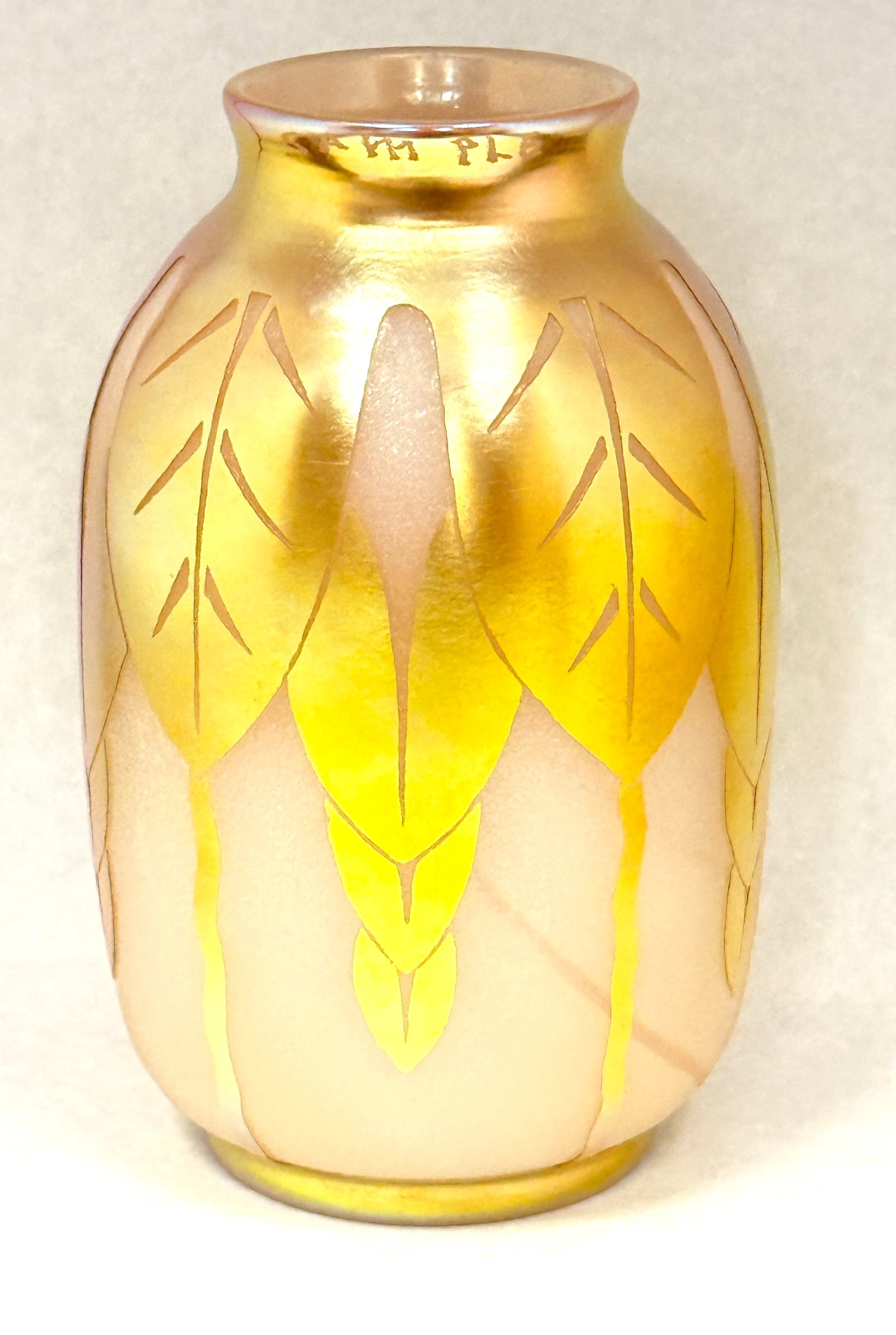 Rare Steuben Acid Cutback Vase: Rare Steuben acid cutback vase, gold aurene over a striated opal, signed Sample around the rim; ht. 8". CONDITION: no chips, cracks, repairs, or material defects found, Jaremos attempts to call any