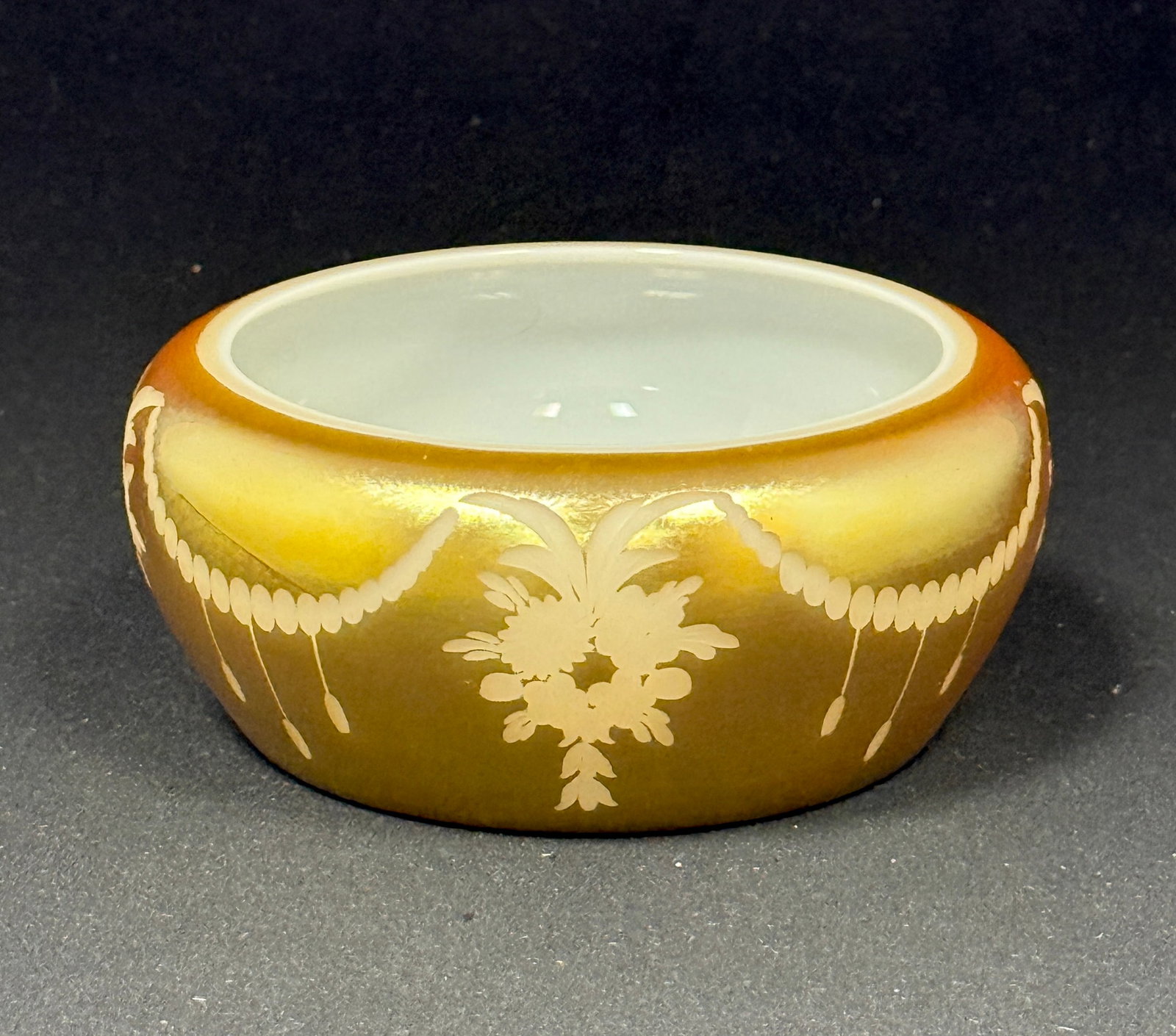 Steuben Small Acid Cutback bowl: Steuben small acid cutback bowl with etched flower on gold aurene; diameter 4 1/2". CONDITION: no chips, cracks, repairs, or material defects found, Jaremos attempts to call any material flaw that
