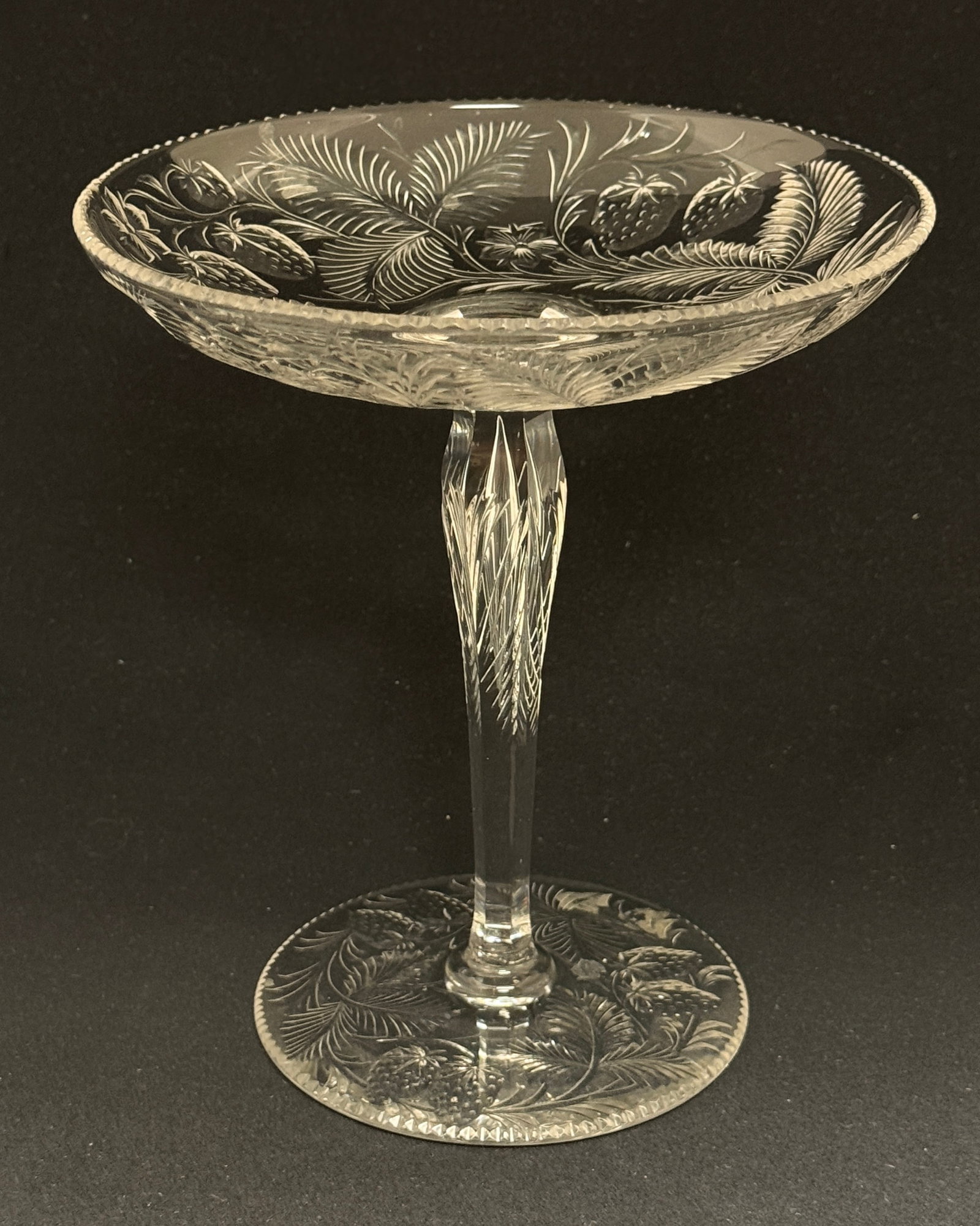 Cut Glass Compote: Cut glass compote with strawberries; ht. 7 3/4". CONDITION: no chips, cracks, repairs, or material defects found, Jaremos attempts to call any material flaw that affects the price, but minor