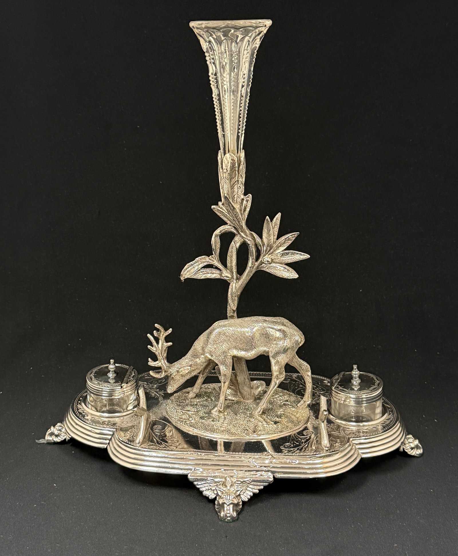 Metal and Cut Glass Ink Stand: Metal and cut glass figural ink stand with an epergne vase and 2 ink wells; ht. 12". CONDITION: no chips, cracks, repairs, or material defects found, Jaremos attempts to call any material flaw that af