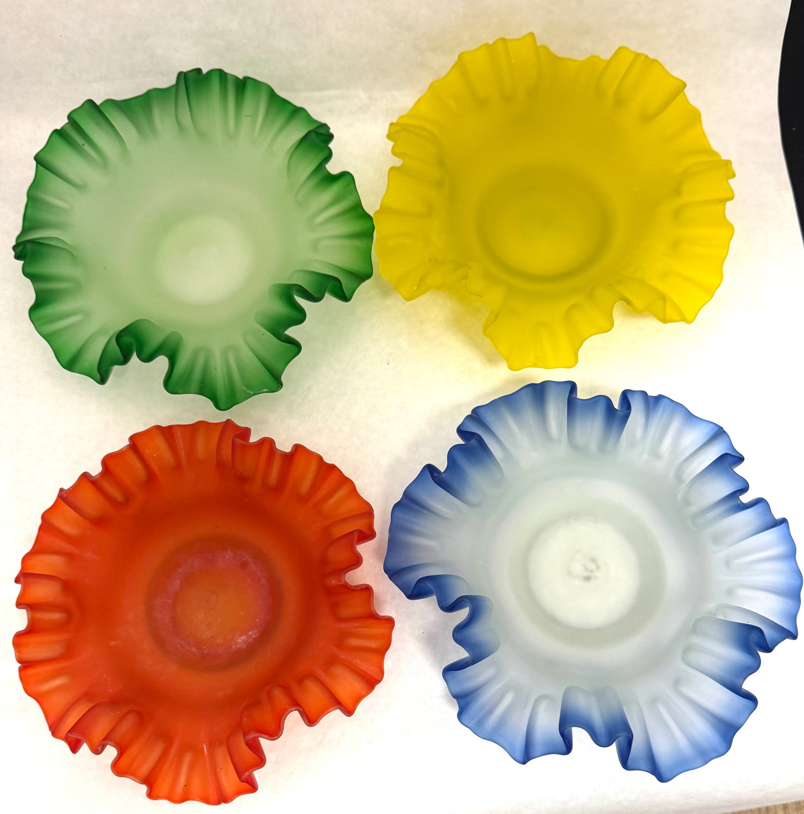 4 Frosted Bride's Bowls: 4 bride's bowls in blue, yellow, green, and red, 7 1/2" wide. CONDITION: no chips, cracks, repairs, or material defects found, Jaremos attempts to call any material flaw that affects the price, but