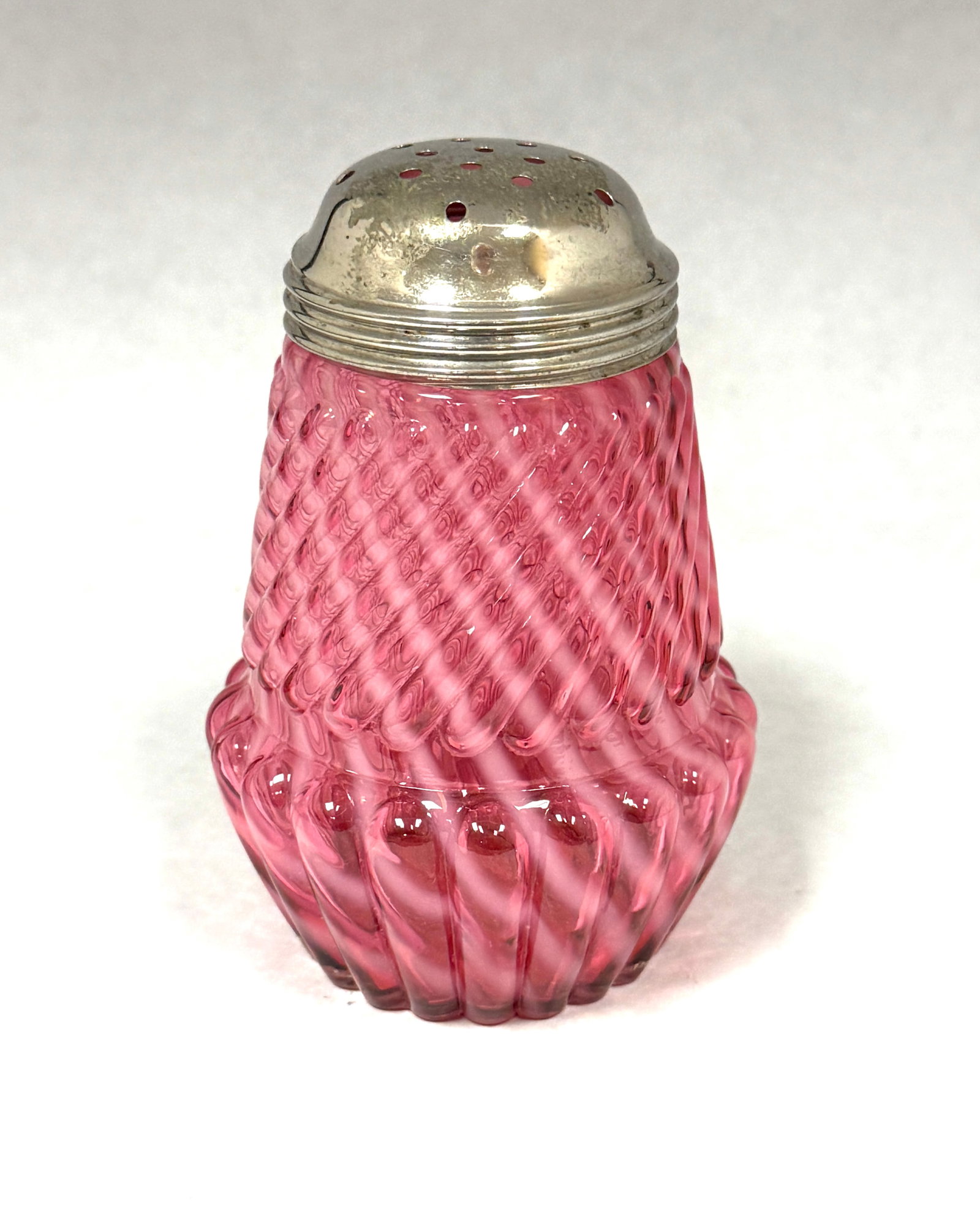 Chrysanthemum Base Shaker: Opalescent cranberry chrysanthemum base sugar shaker; ht. 4 3/4". CONDITION: no chips, cracks, repairs, or material defects found, Jaremos attempts to call any material flaw that affects the price,