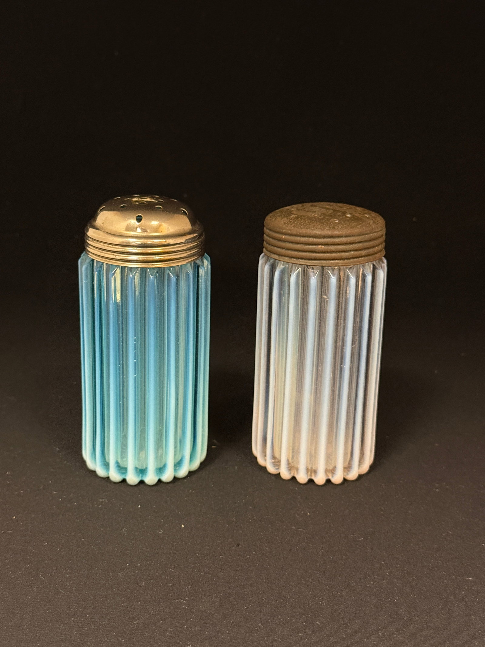 2 Beatty Striped Sugars: 2 Beatty striped sugar shakers one blue and one opal; ht. 5". CONDITION: no chips, cracks, repairs, or material defects found, Jaremos attempts to call any material flaw that affects the price, but