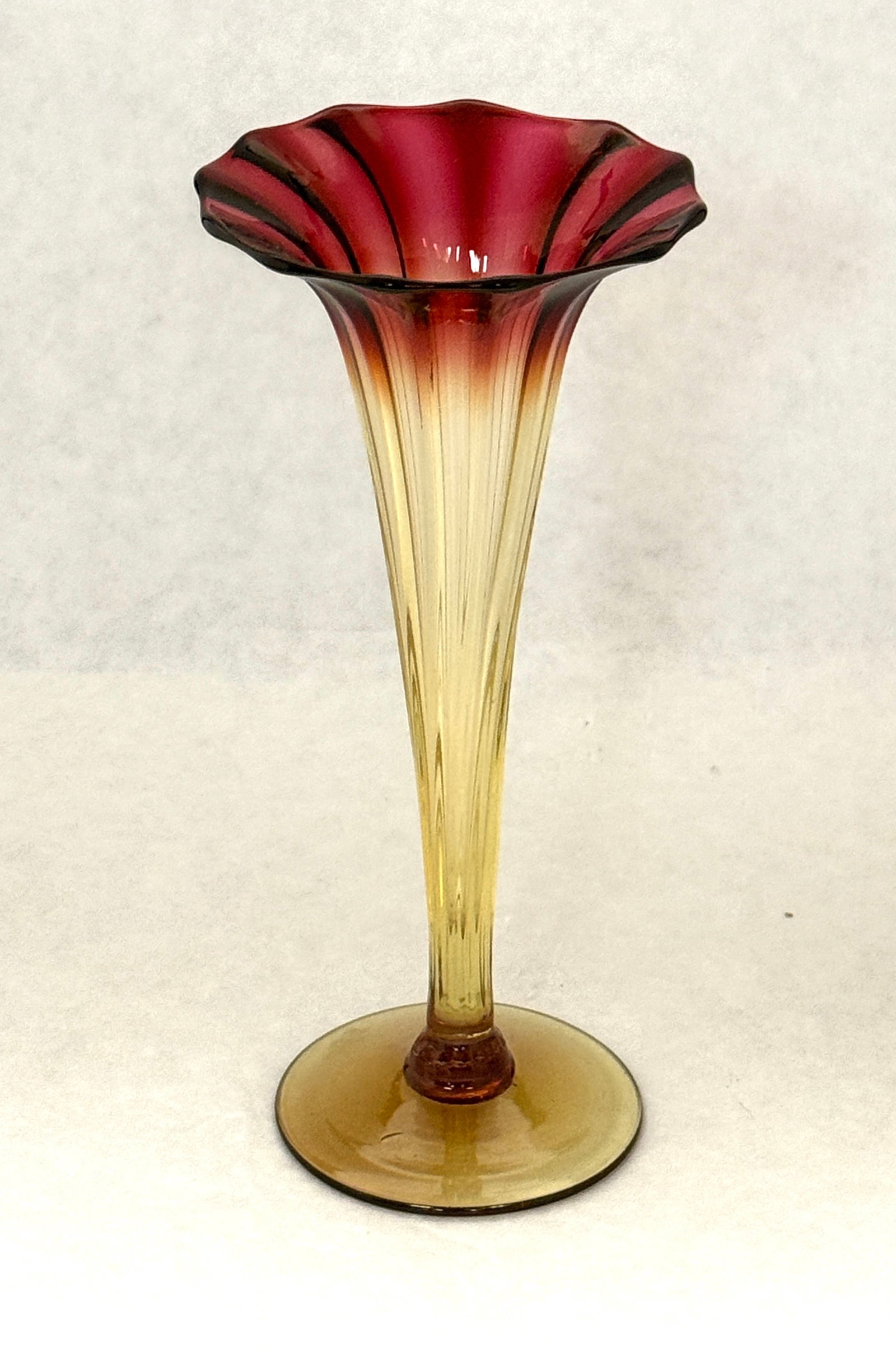 New England Amberina Lily: New England Amberina optic ribbed Lily vase, 7 1/2" ht. CONDITION: no chips, cracks, repairs, or material defects found, Jaremos attempts to call any material flaw that affects the price, but minor