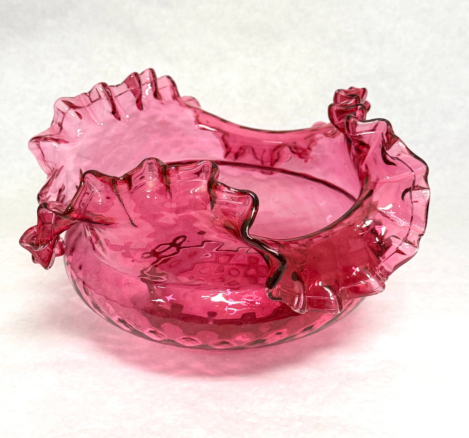 Cranberry Bride's Bowl: Cranberry bride's bowl in the optic diamond pattern, 8 1/2" wide. CONDITION: no chips, cracks, repairs, or material defects found, Jaremos attempts to call any material flaw that affects the price,
