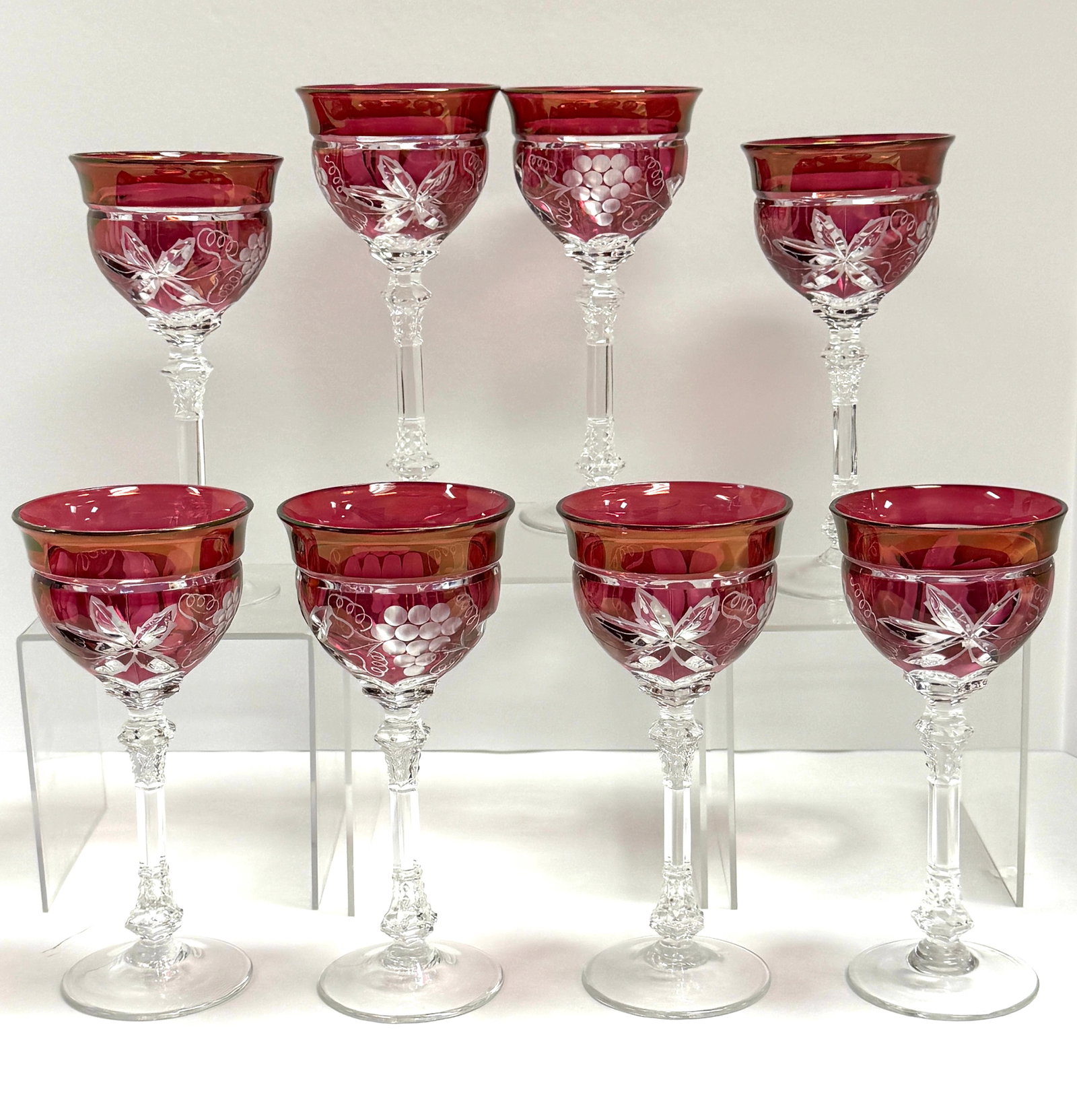 8 Ruby Cut to Clear Goblets: 8 ruby cut to clear goblets with grapes and leaves; ht. 7 3/4". CONDITION: no chips, cracks, repairs, or material defects found, Jaremos attempts to call any material flaw that affects the price, but 