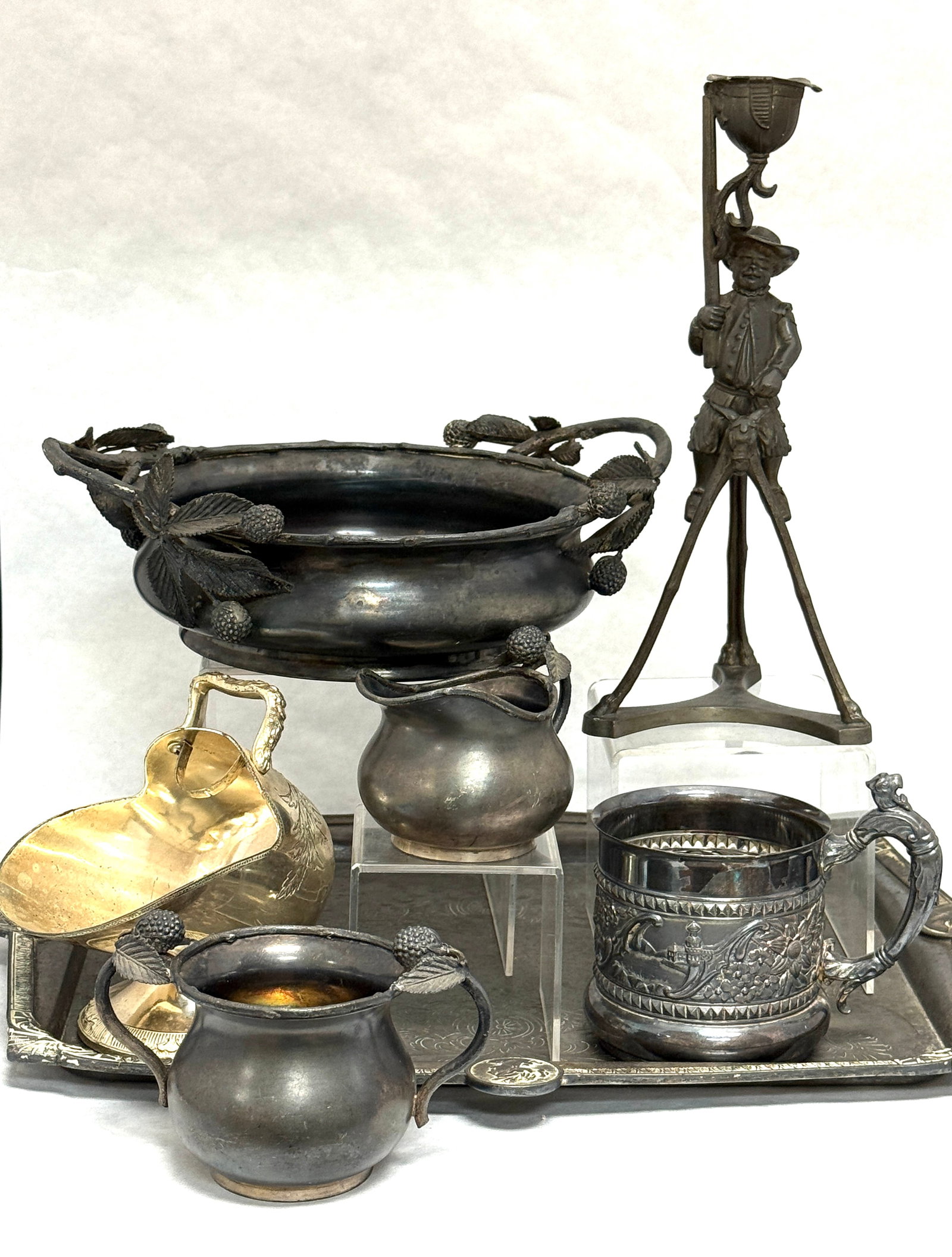 7 Silver Plate Items: 7 silver plate items including Reed & Barton figural candlestick, Hartford berry set, Pairpoint mug and more; tray 15" length. CONDITION: no chips, cracks, repairs, or material defects found, Jaremos