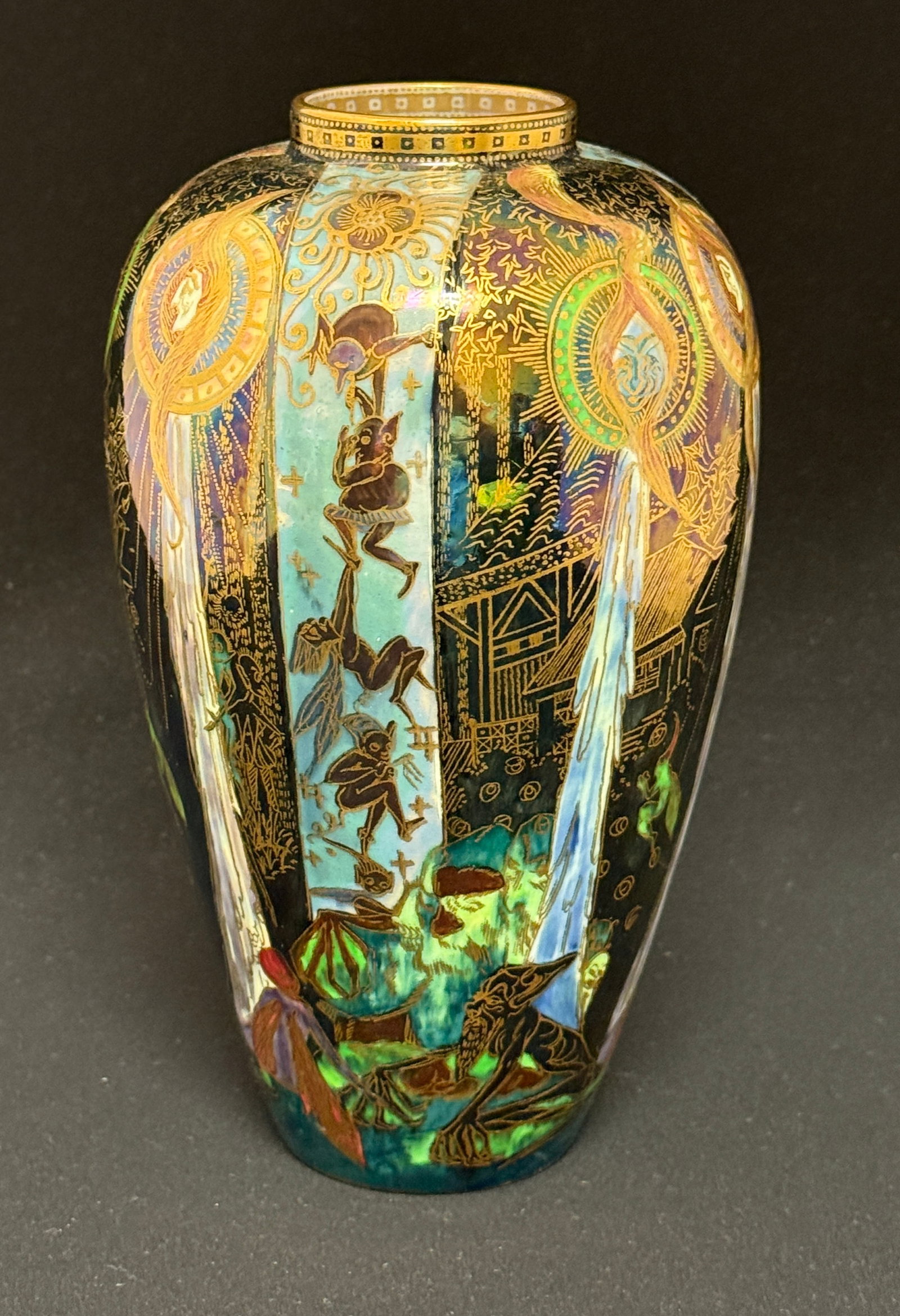 Fairyland Lustre Candlemas Vase: Fairyland Lustre Candlemas vase, ht 8"; marked Wedgewood, England. CONDITION: repair on bottom of vase, see picture.