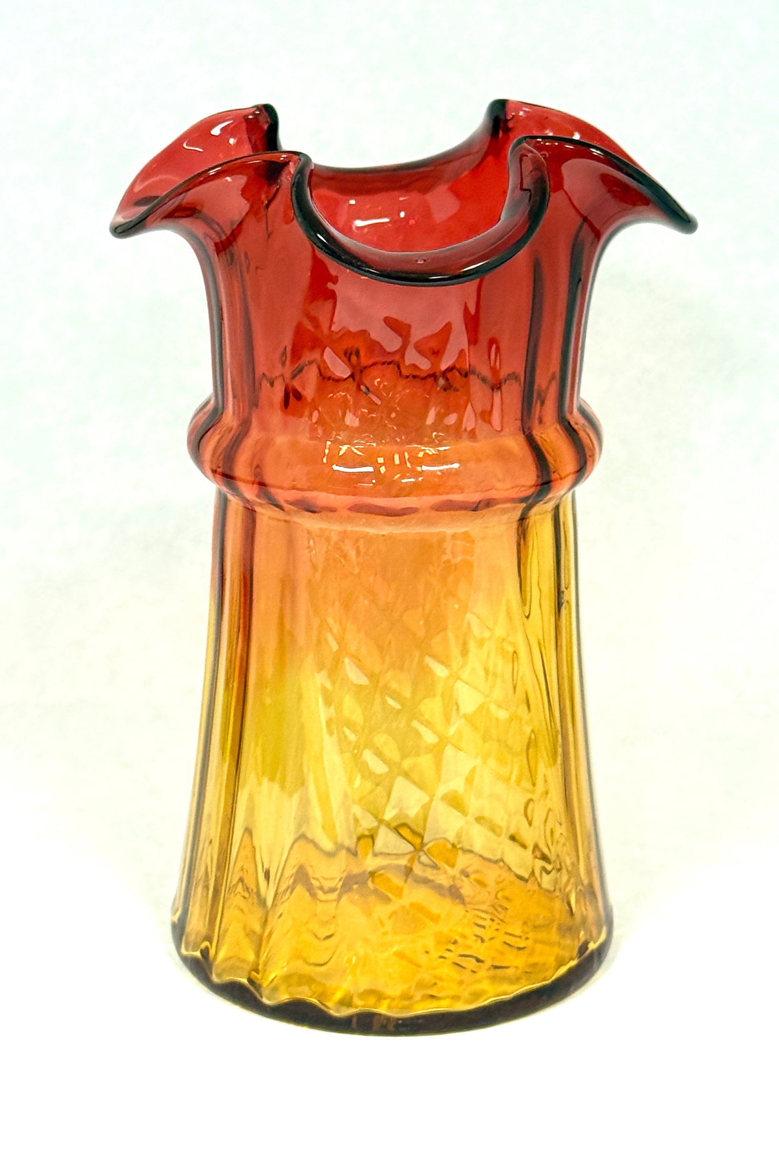 Amberina Rib and Diamond Vase: Amberina rib and diamond quilted vase; ht. 7 1/4". CONDITION: no chips, cracks, repairs, or material defects found, Jaremos attempts to call any material flaw that affects the price, but minor
