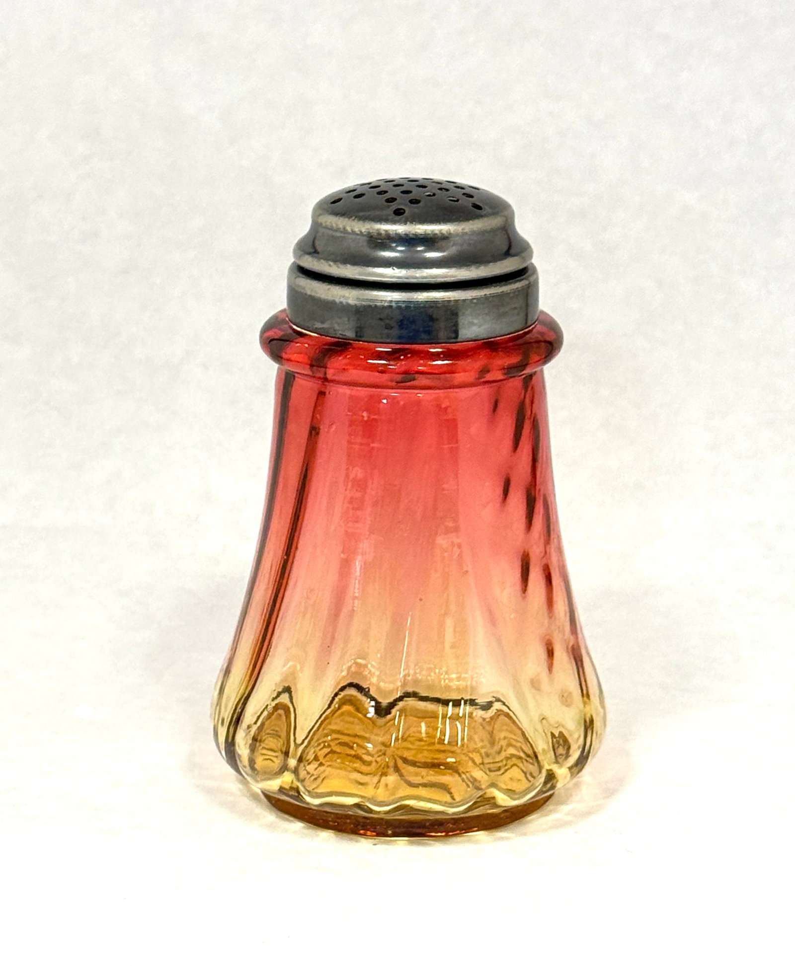 Amberina Rib & Diamond Shaker: Amberina rib and diamond sugar shaker; 5 1/4". CONDITION: no chips, cracks, repairs, or material defects found, Jaremos attempts to call any material flaw that affects the price, but minor scratches