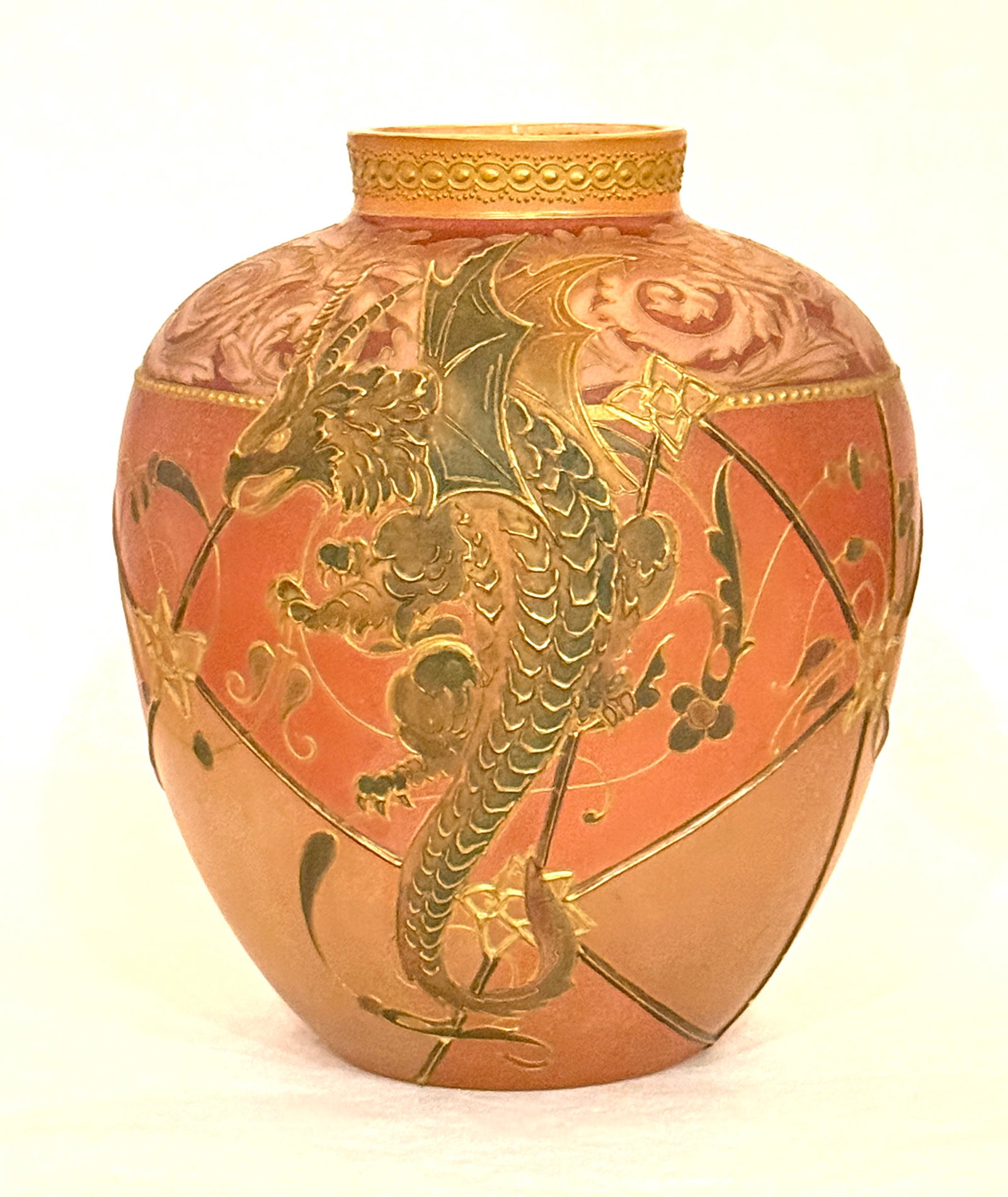 Mt. Washington Vase: Mt. Washington Royal Flemish Vase, ovoid form with raised gold panels decorated with a central dragon and overall gold scrolling, 9" ht. CONDITION: no chips, cracks, repairs, or material defects found