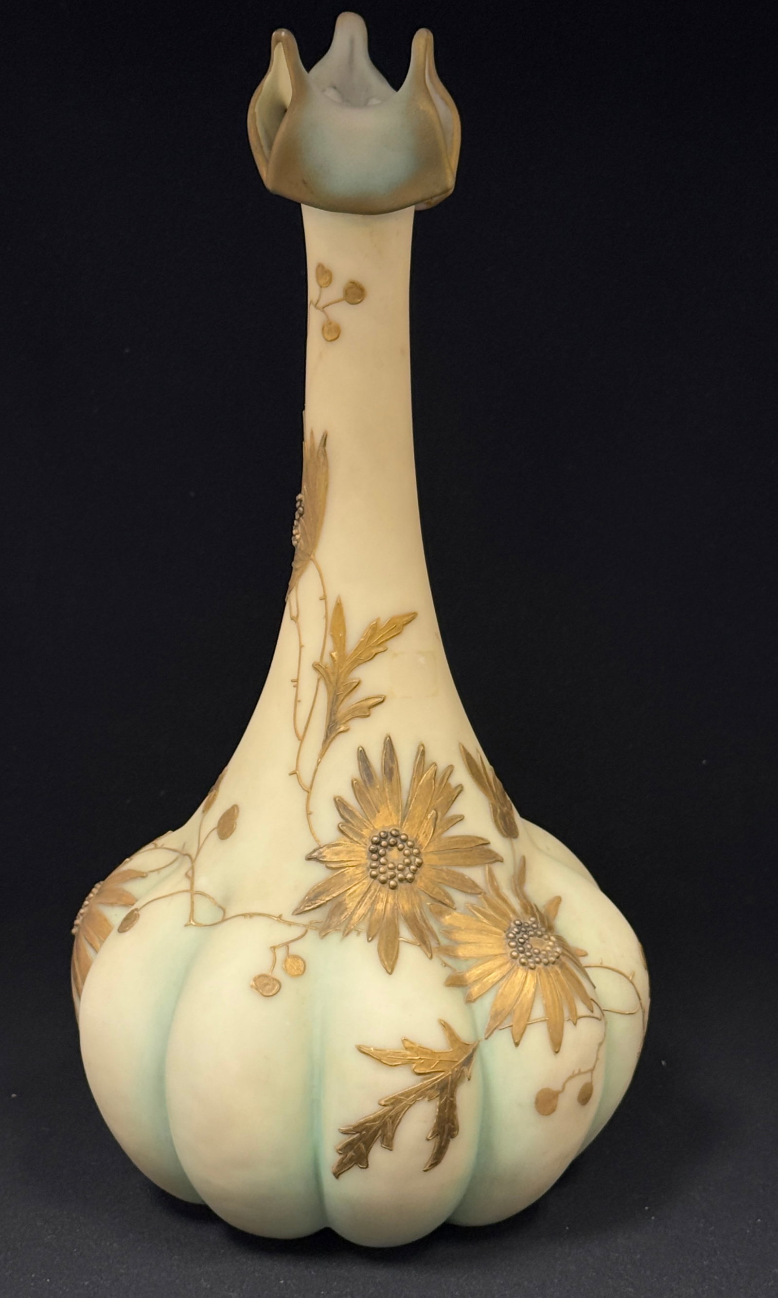 Mt. Washington Vase: Mt. Washington Crown Milano glass vase, melon ribbed stick vase with a tri fold pointed rim decorated with large gold flowers and leaves on a subtle turquoise background signed with the CM crown