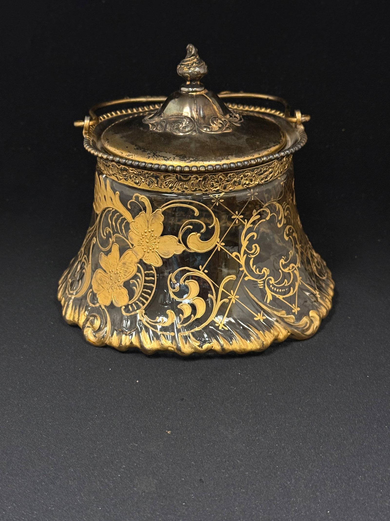 Pairpoint Biscuit Jar: Pairpoint clear with gold enameling biscuit jar; width 7". CONDITION: no chips, cracks, repairs, or material defects found, Jaremos attempts to call any material flaw that affects the price, but