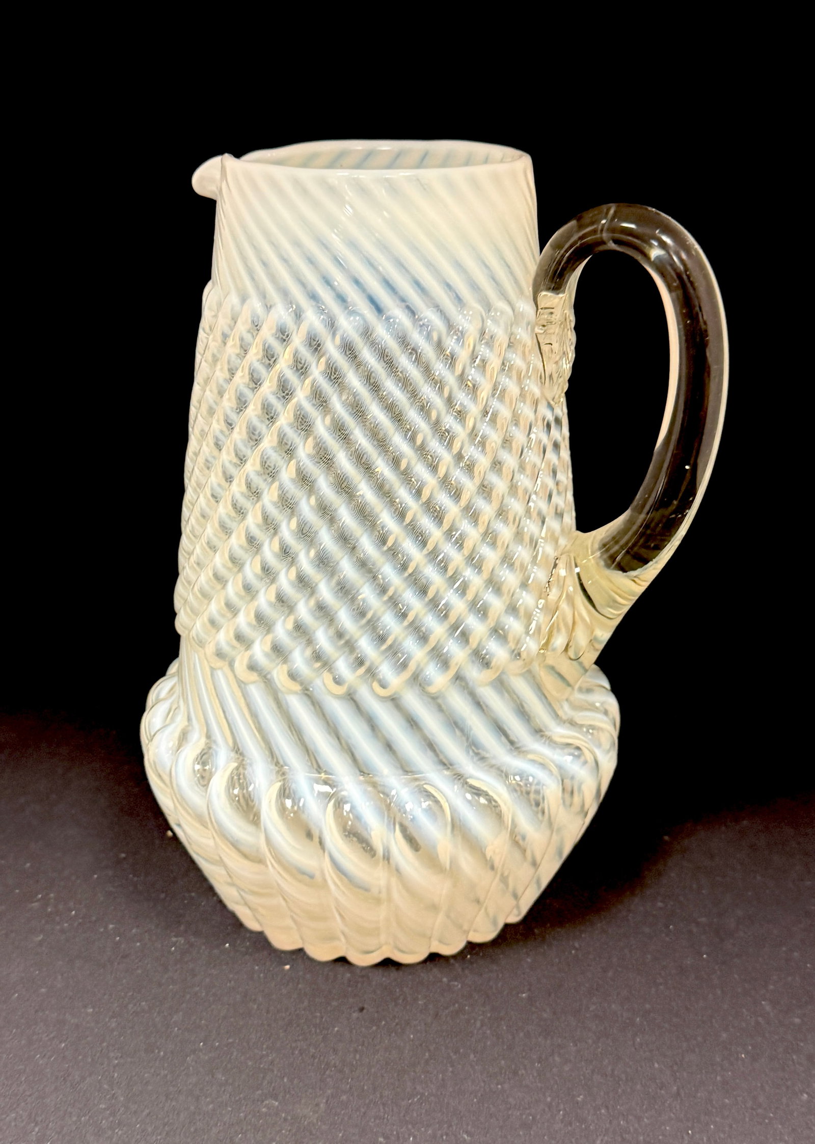 Chrysanthemum Base Pitcher: Northwood chrysanthemum base white swirl pitcher; ht. 9". CONDITION: no chips, cracks, repairs, or material defects found, Jaremos attempts to call any material flaw that affects the price, but minor 