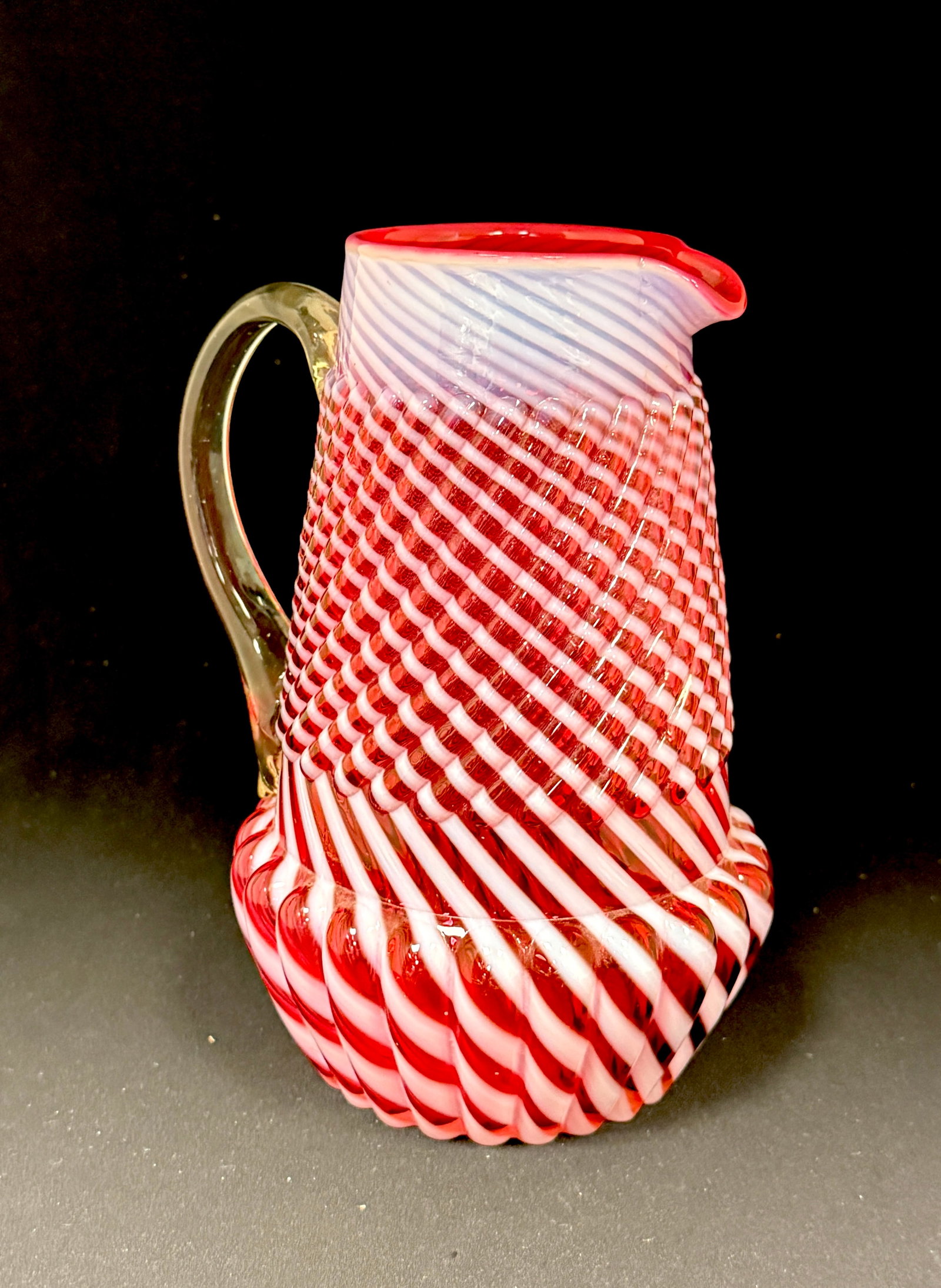 Chrysanthemum Base Pitcher: Northwood Chrysanthemum base cranberry swirl pitcher, 9" ht. CONDITION: no chips, cracks, repairs, or material defects found, Jaremos attempts to call any material flaw that affects the price, but min