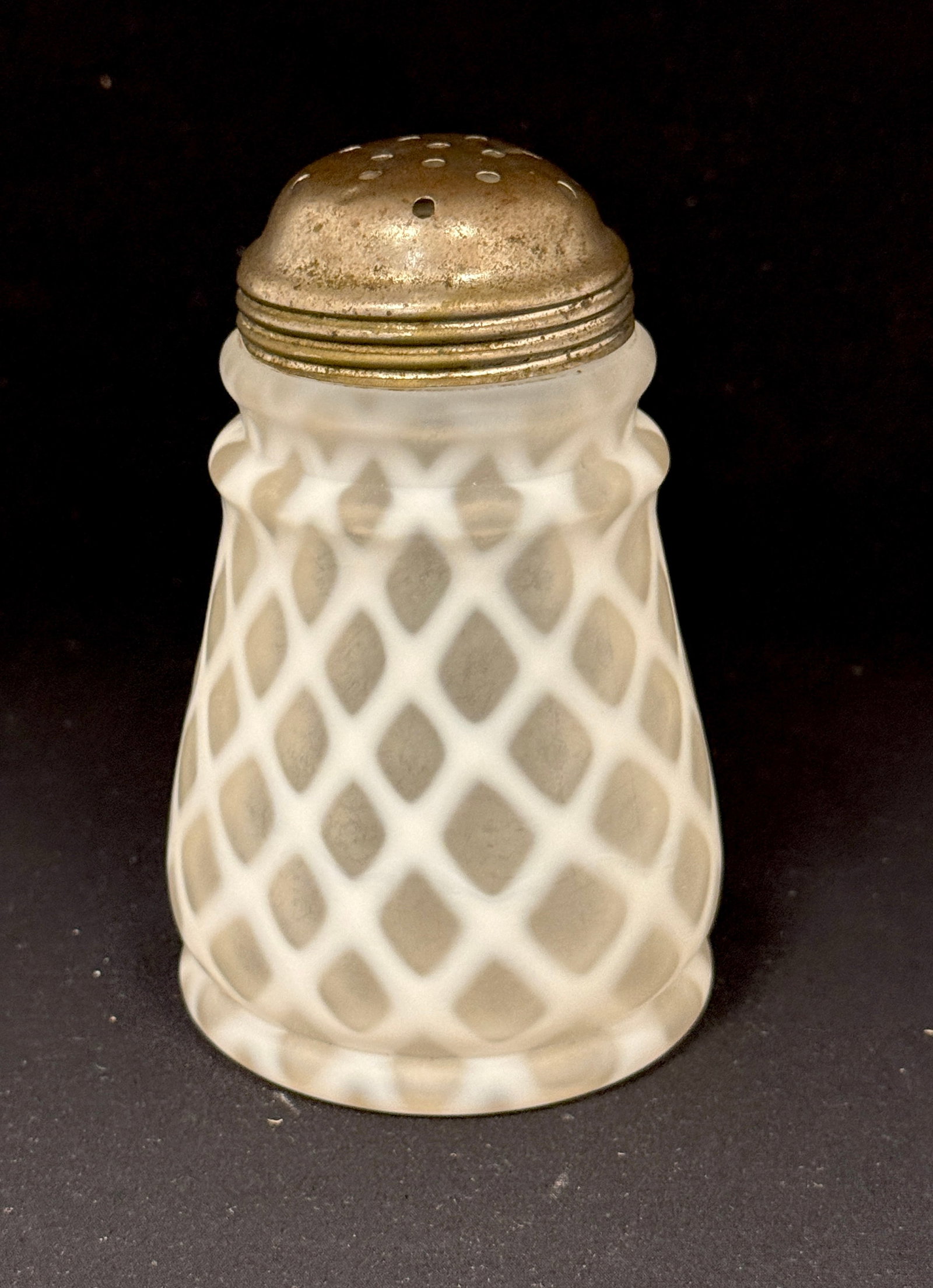 Opalescent Lattice Shaker: Opalescent tapered lattice sugar shaker in white; ht. 5". CONDITION: no chips, cracks, repairs, or material defects found, Jaremos attempts to call any material flaw that affects the price, but minor 