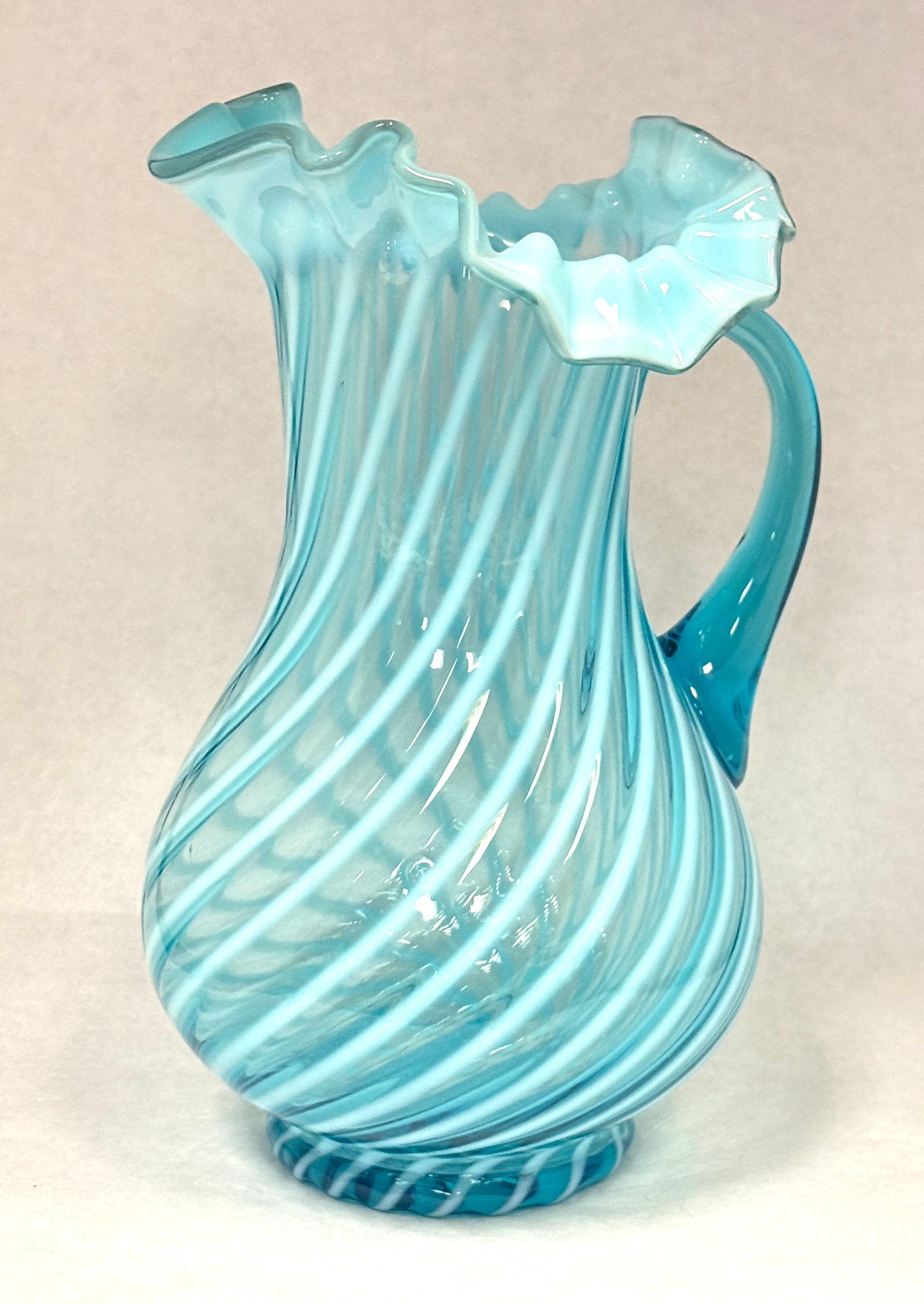 Jefferson Blue Swirl Pitcher: Blue Jefferson swirl pitcher; ht. 11". CONDITION: no chips, cracks, repairs, or material defects found, Jaremos attempts to call any material flaw that affects the price, but minor scratches and