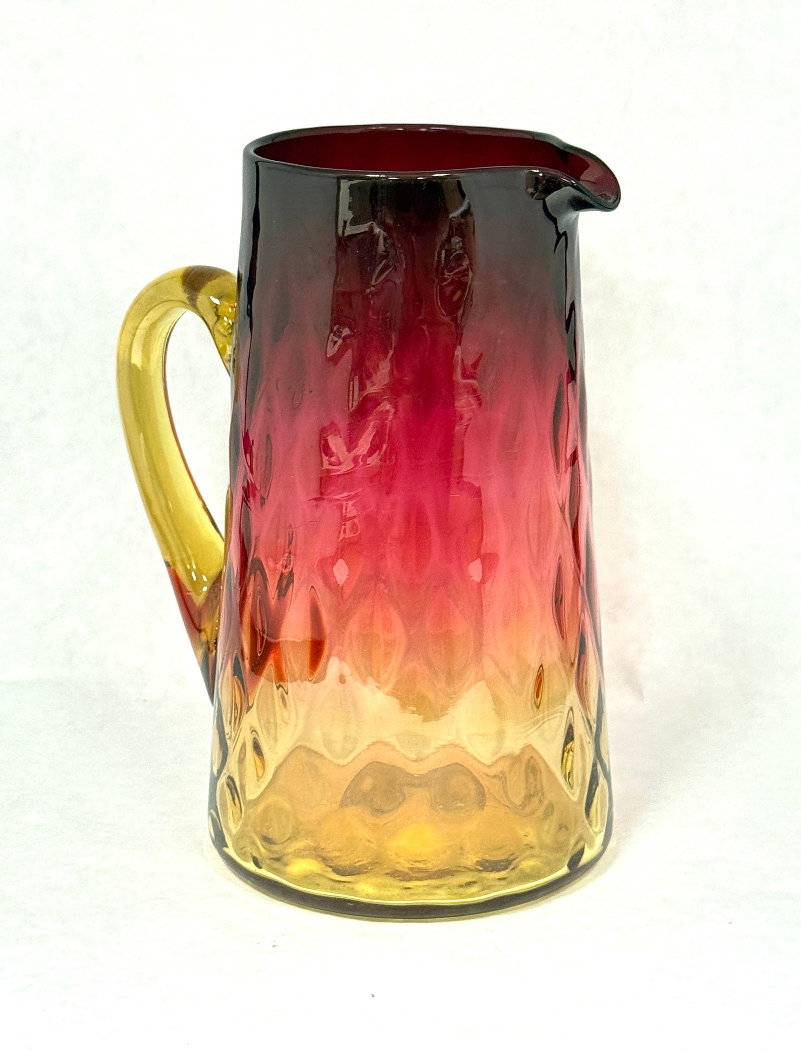 Amberina Tankard: Amberina tankard from the collection of Fred Rindge; ht. 7". CONDITION: no chips, cracks, repairs, or material defects found, Jaremos attempts to call any material flaw that affects the price, but