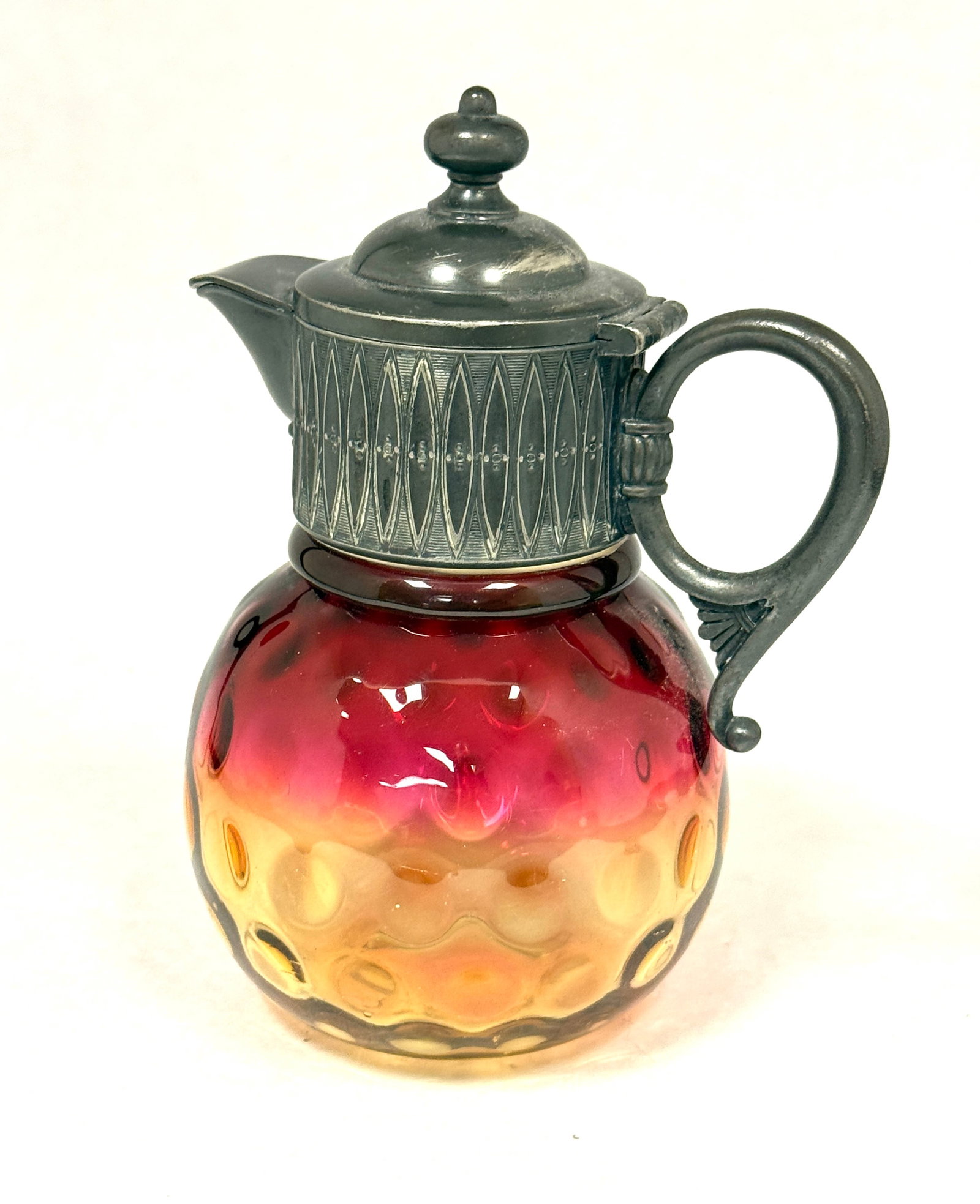 Amberina Syrup: Amberina syrup; ht. 5 1/2". CONDITION: no chips, cracks, repairs, or material defects found, Jaremos attempts to call any material flaw that affects the price, but minor scratches and color variances