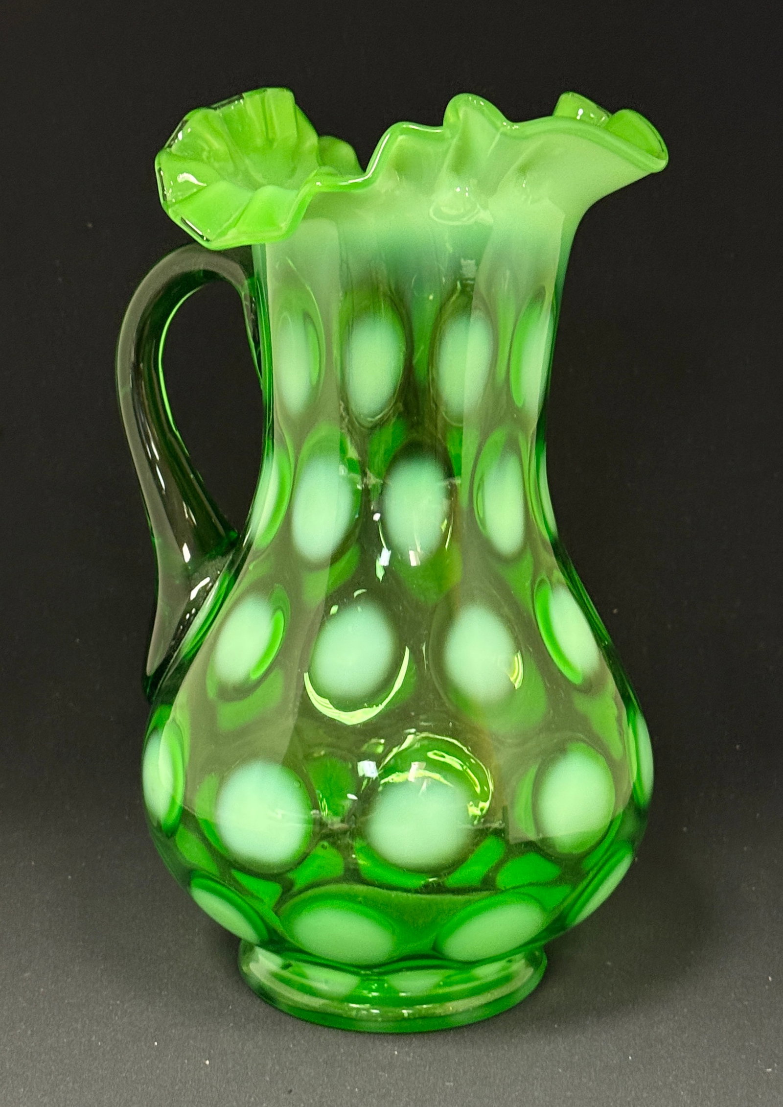 Jefferson Opalescent Pitcher: Jefferson opalescent green coin spot pitcher; ht. 10 3/4". CONDITION: no chips, cracks, repairs, or material defects found, Jaremos attempts to call any material flaw that affects the price, but