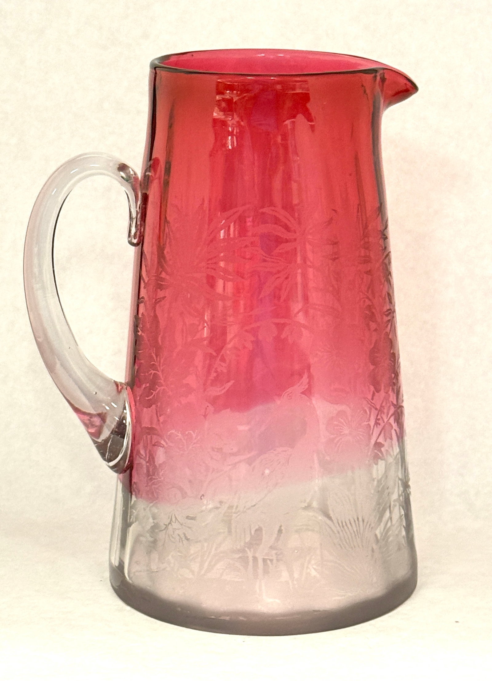Rubina Ribbed Optic Pitcher: Rubina optic ribbed pitcher with etched floral design; ht. 9 1/8". CONDITION: no chips, cracks, repairs, or material defects found, Jaremos attempts to call any material flaw that affects the price,